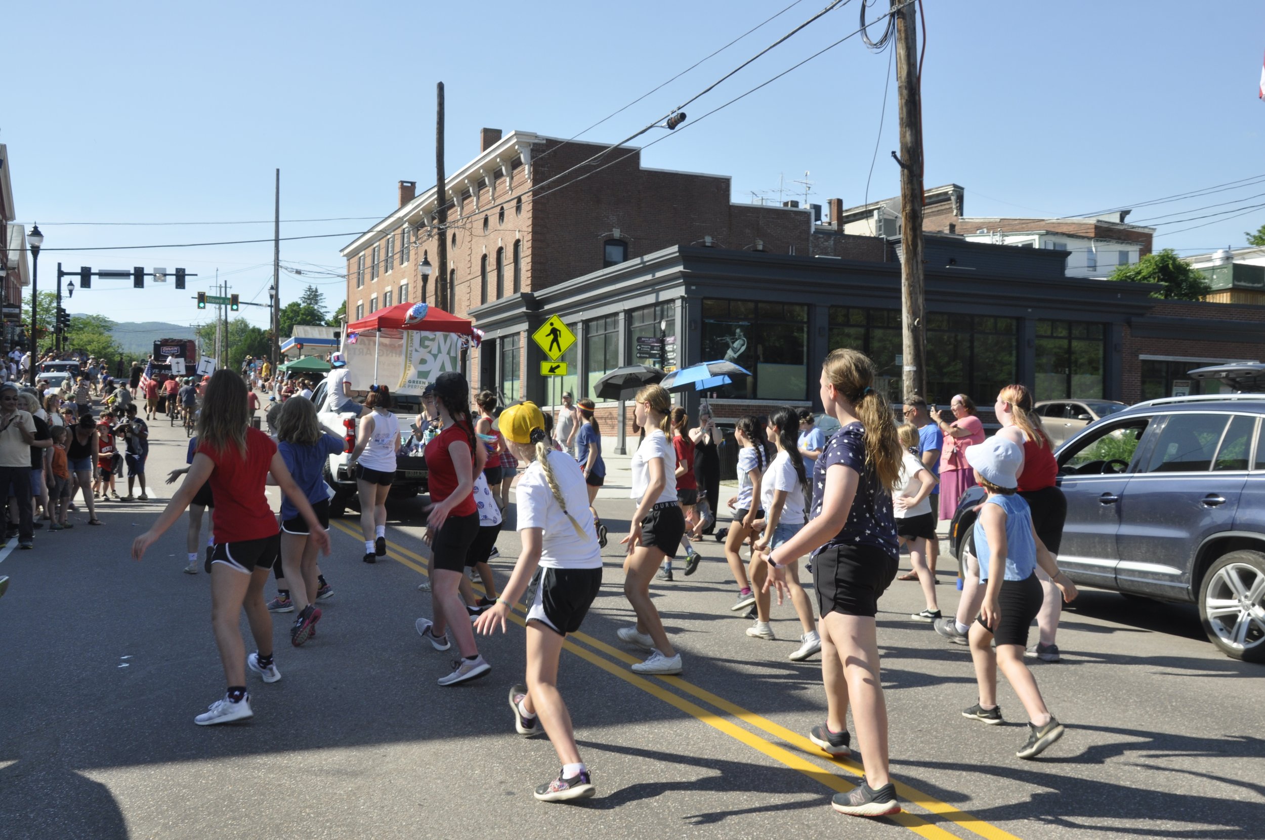  Green Mountain Performing Arts dancers dance their way up Main Street.  Photo by Lisa Scagliotti 
