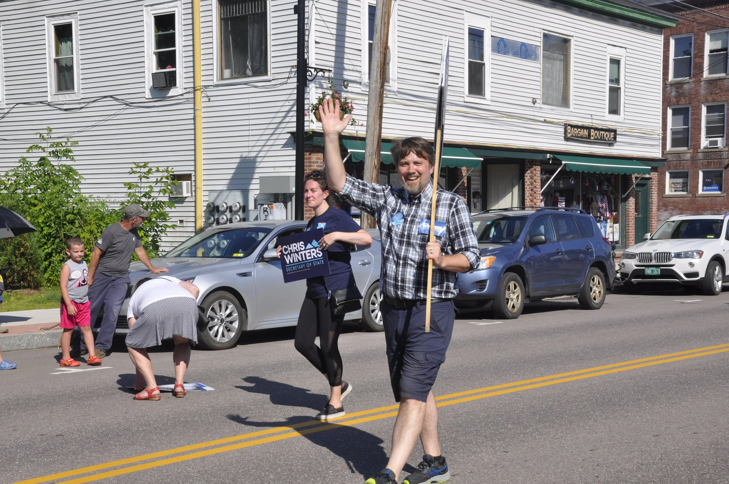  Deputy Secretary of State Chris Winters marches as he campaigns to be the Democratic nominee for secretary of state in November. Photo by Lisa Scagliotti  
