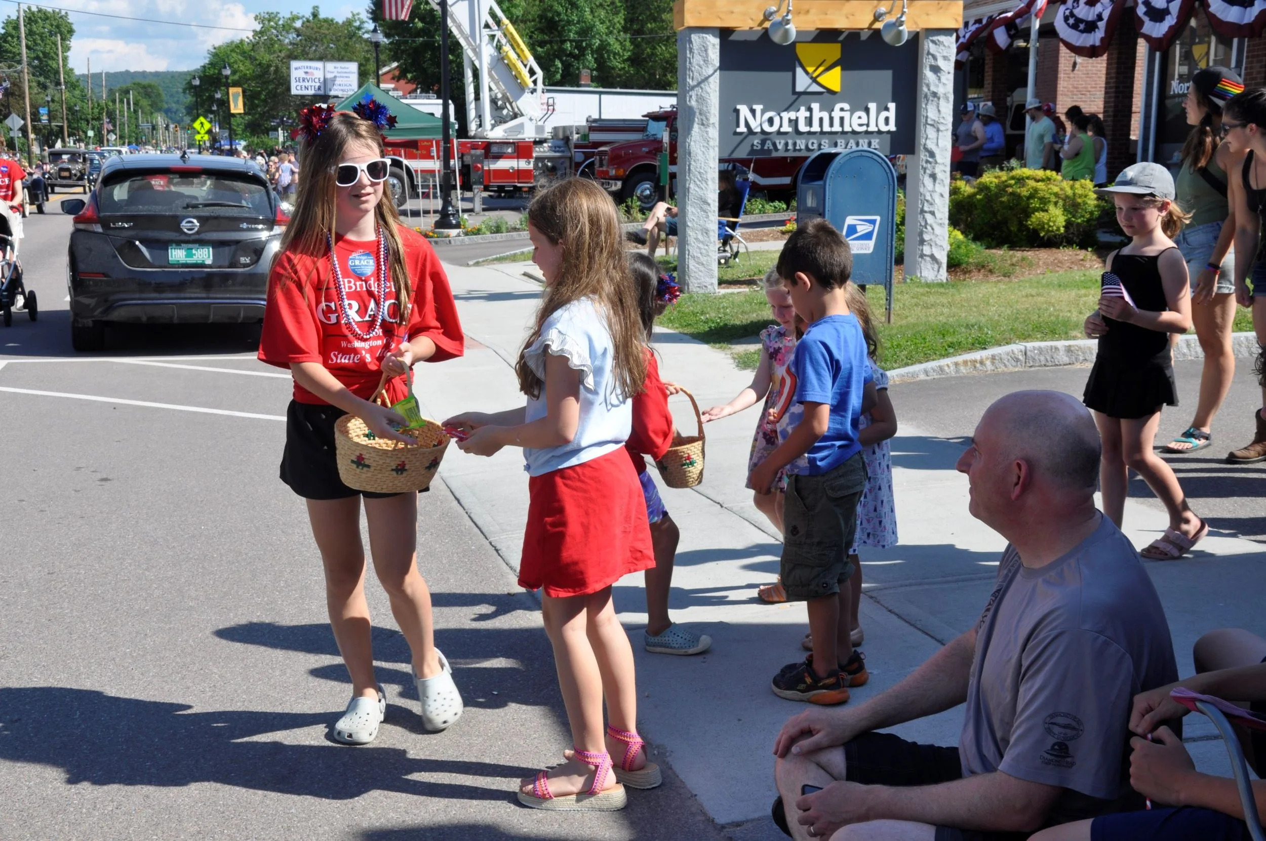  Young supporters of Assistant State’s Attorney Bridget Grace running for Washington County State’s Attorney hand out candy to kids lining the sidewalk. Photo by Lisa Scagliotti 