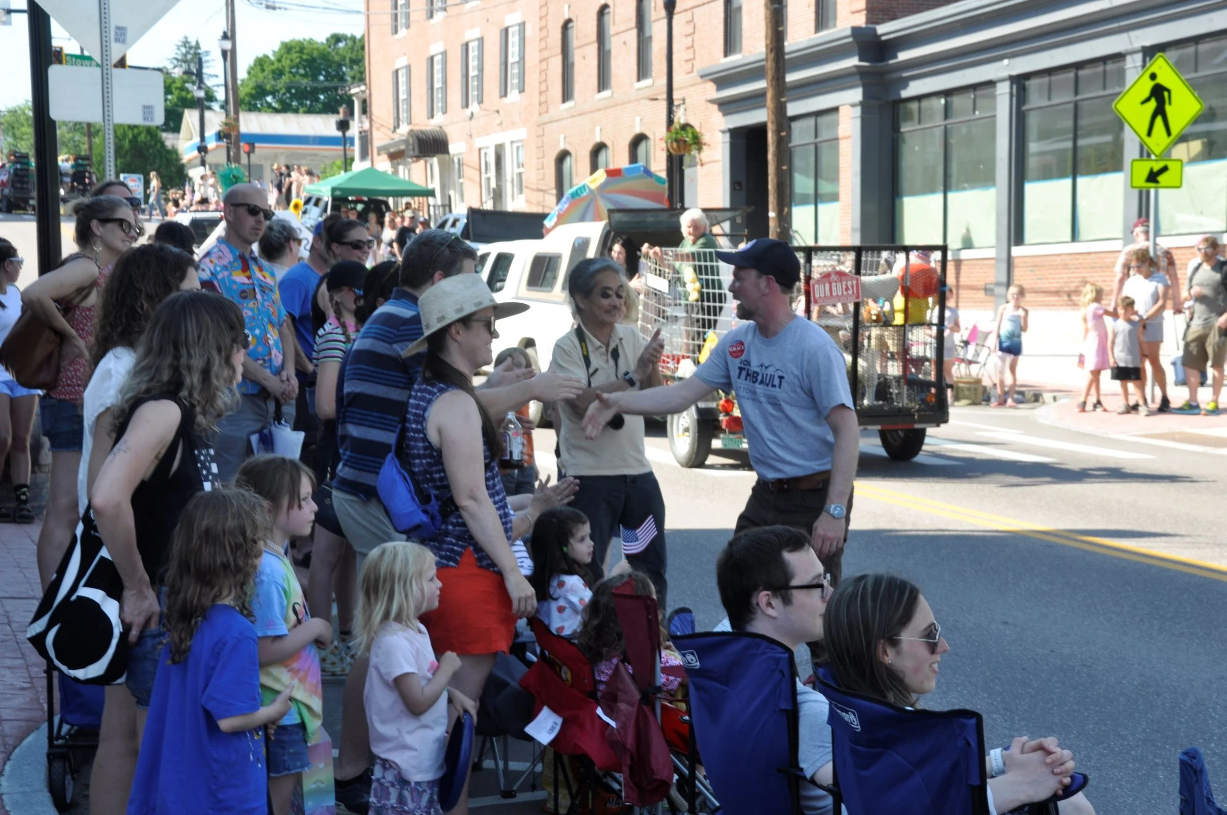 Washington County State’s Attorney Rory Thibault, running for the Democratic nomination for state Attorney General, chats with parade-goers. Photo by Lisa Scagliotti 