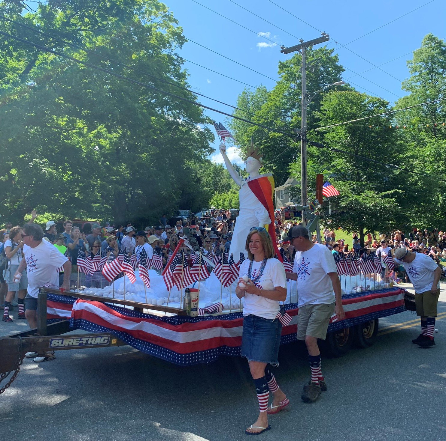  The Sugarbush float tosses “snowballs” to the crowd. 