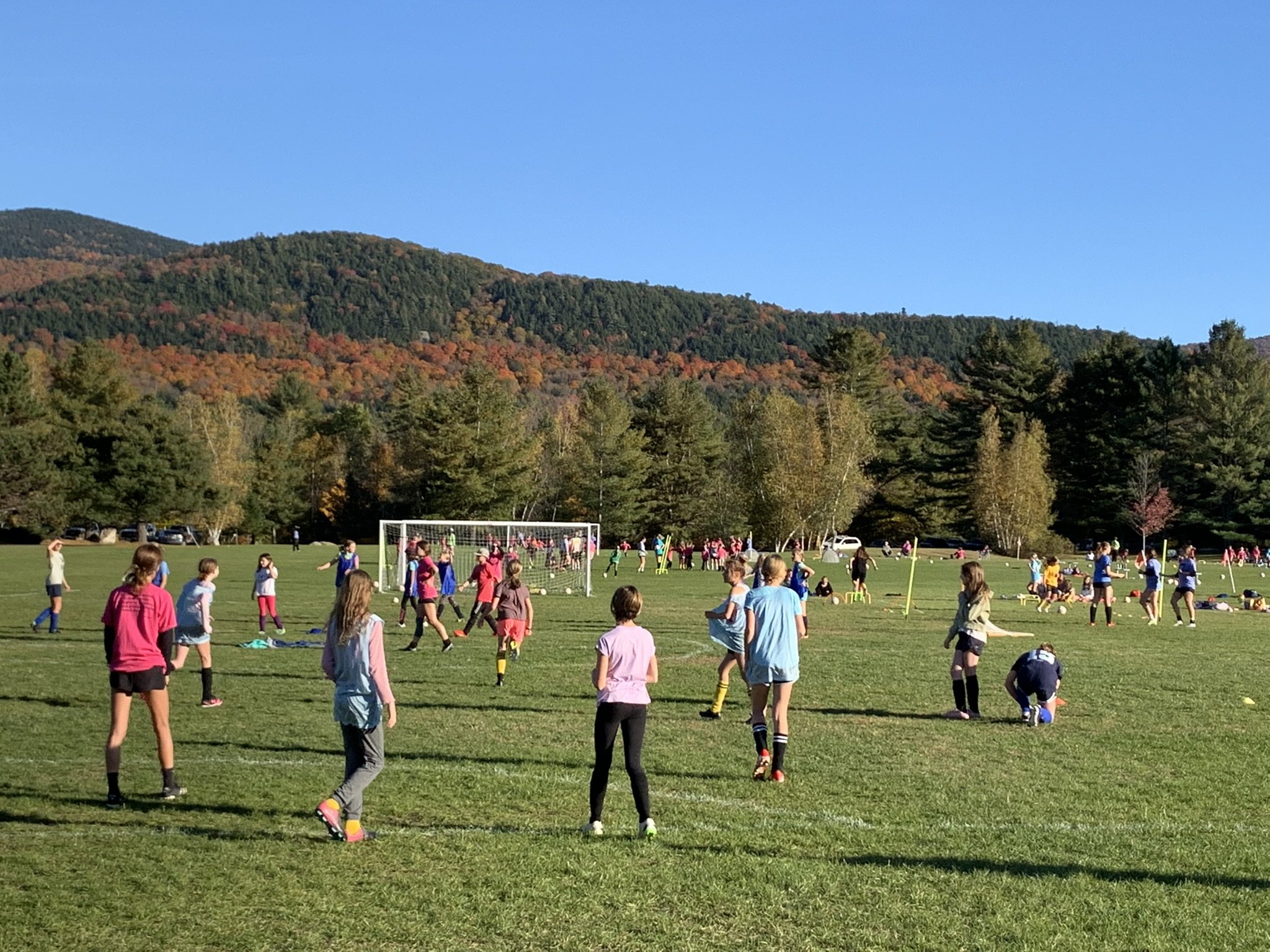  Some groups run dribbling, shooting and passing drills. 