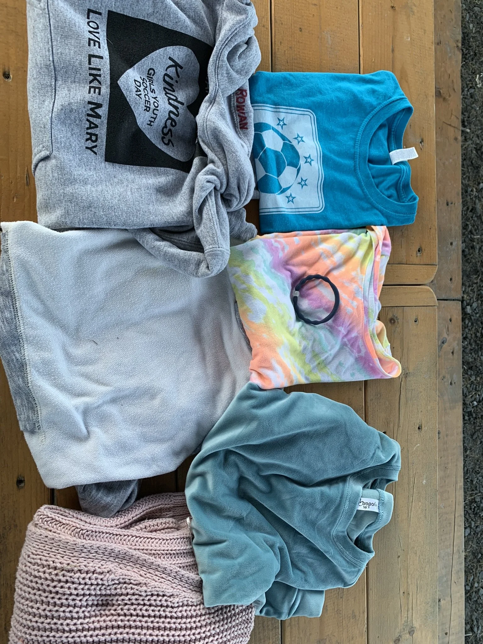  Items from the lost/found pile after the event include a sweatshirt handed out at the start that already had the name “Rowan” written inside.  