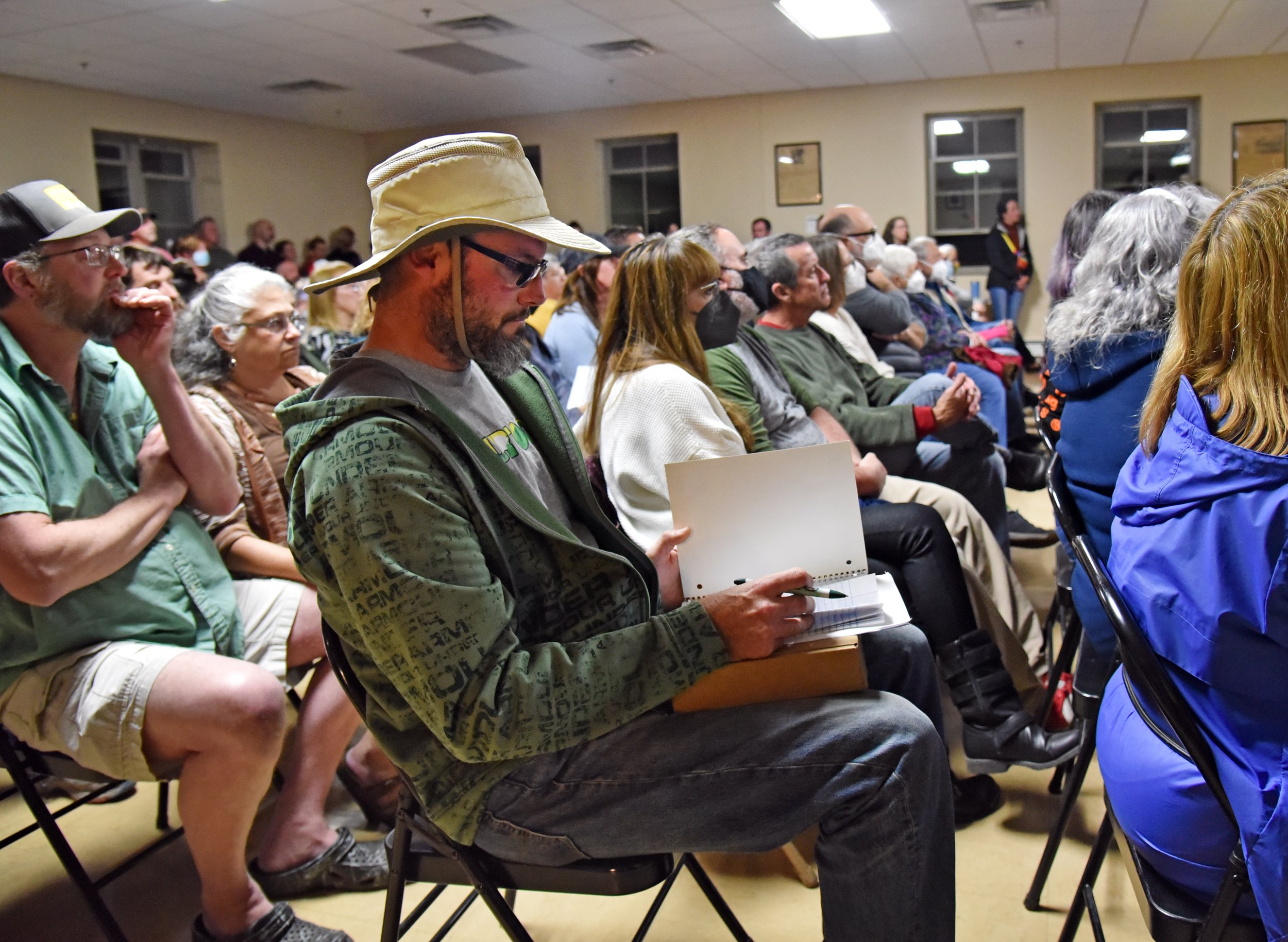   Village resident and electrical contractor Todd Volitis campaigned to make his own offer to buy 51 S. Main. His "Show Up. Rock the Vote" signs sparked public attention. Photo by Gordon Miller  