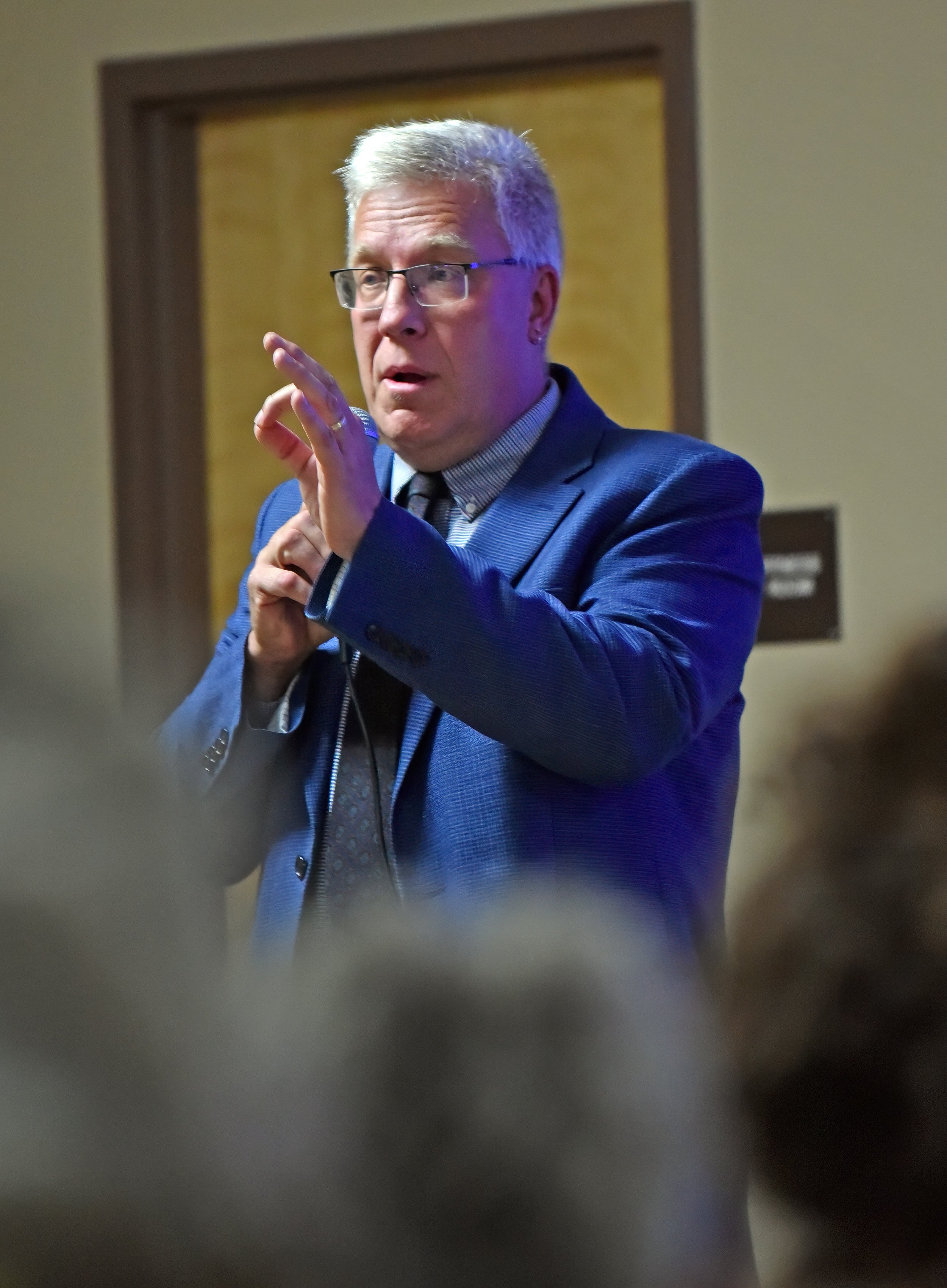   State Rep. Tom Stevens, D-Waterbury, served as moderator of the meeting. Photo by Gordon Miller  