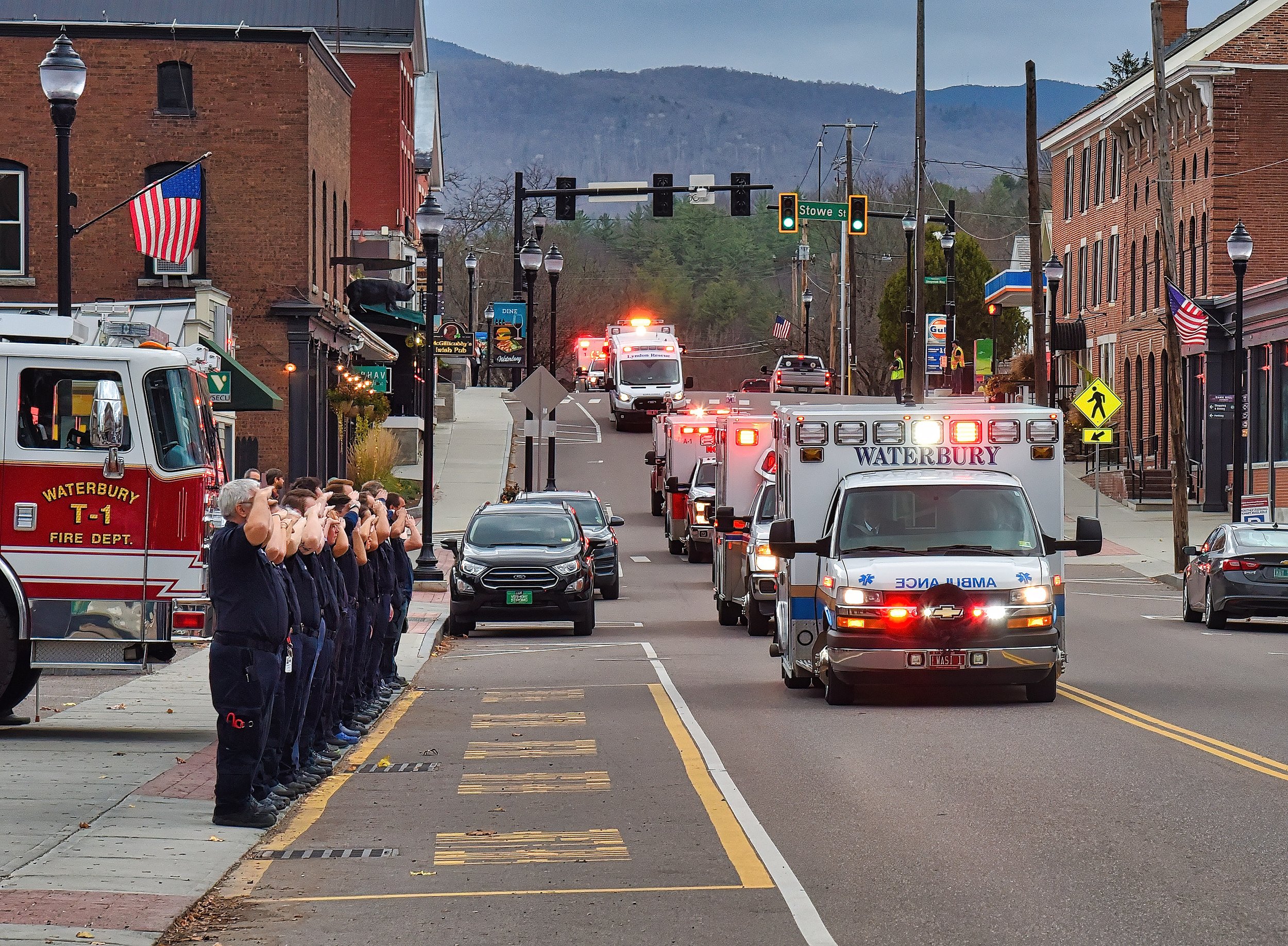  The procession makes its way down Main Street. Photo by Gordon Miller 