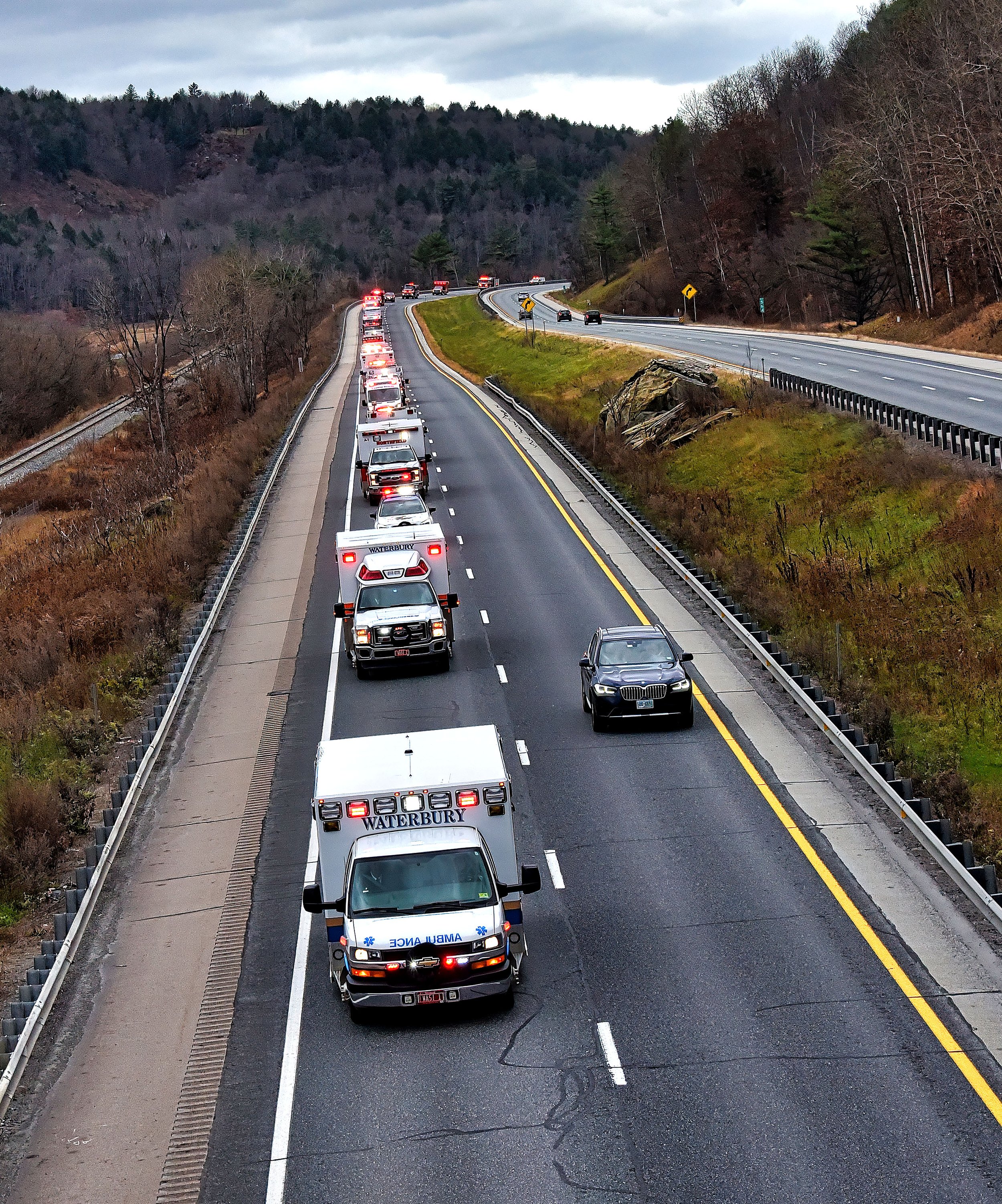  Keeping to the right with lights flashing, the procession moves south to Montpelier in I-89. Photo by Gordon Miller 
