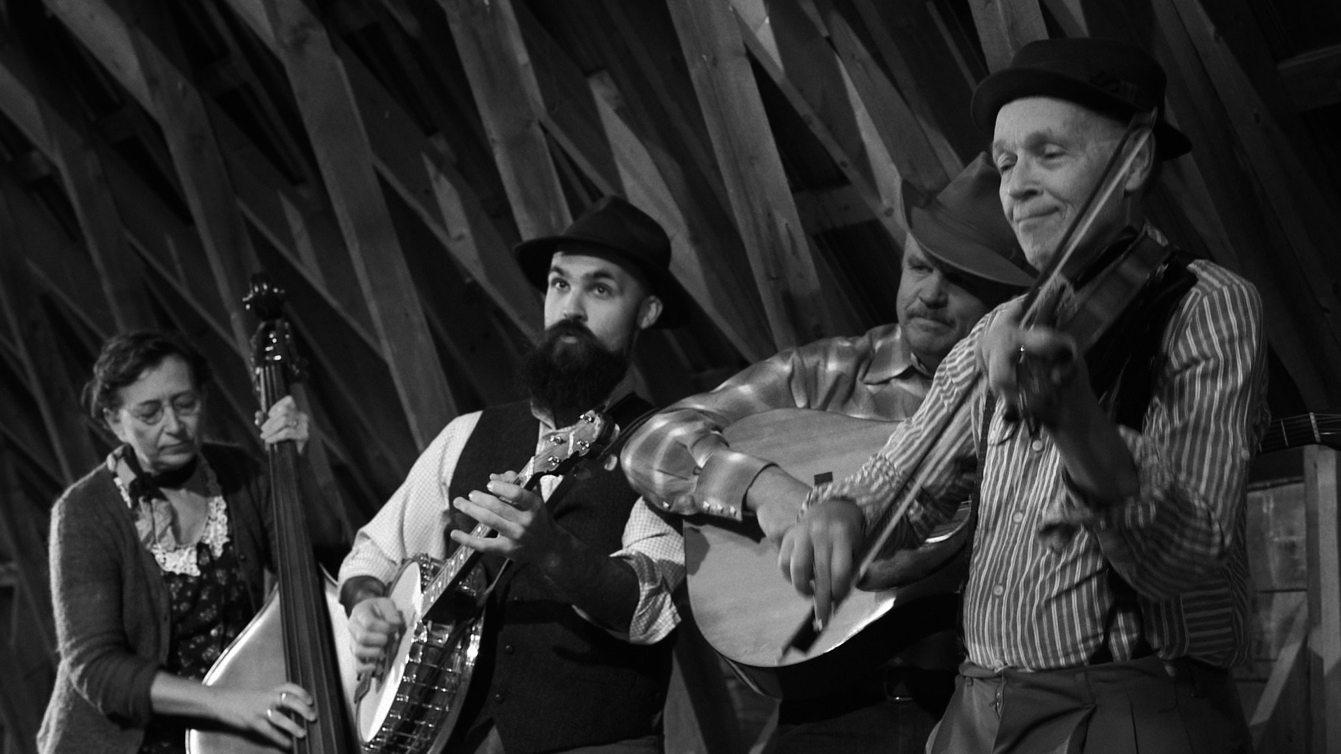   Carrie Cook, Tristan Henderson,   Mark Struhsacker   and Pete Sutherland perform music for the barn dance in 'The Farm Boy.' Photo courtesy Hanging Mudflap Productions  