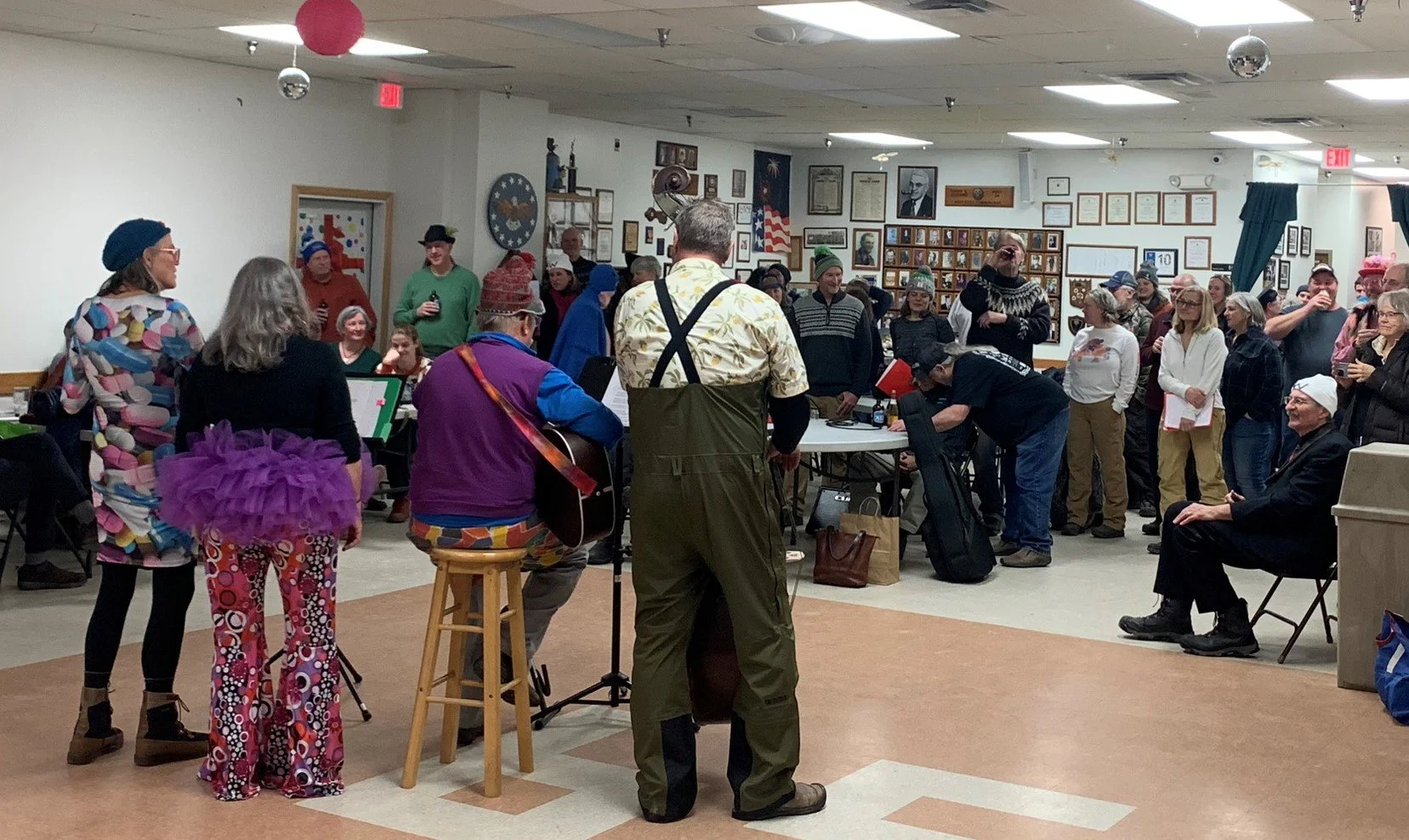   All of the Wassailing acts gather to hear each other's performances for the final round.&nbsp;Photo by Lisa Scagliotti  