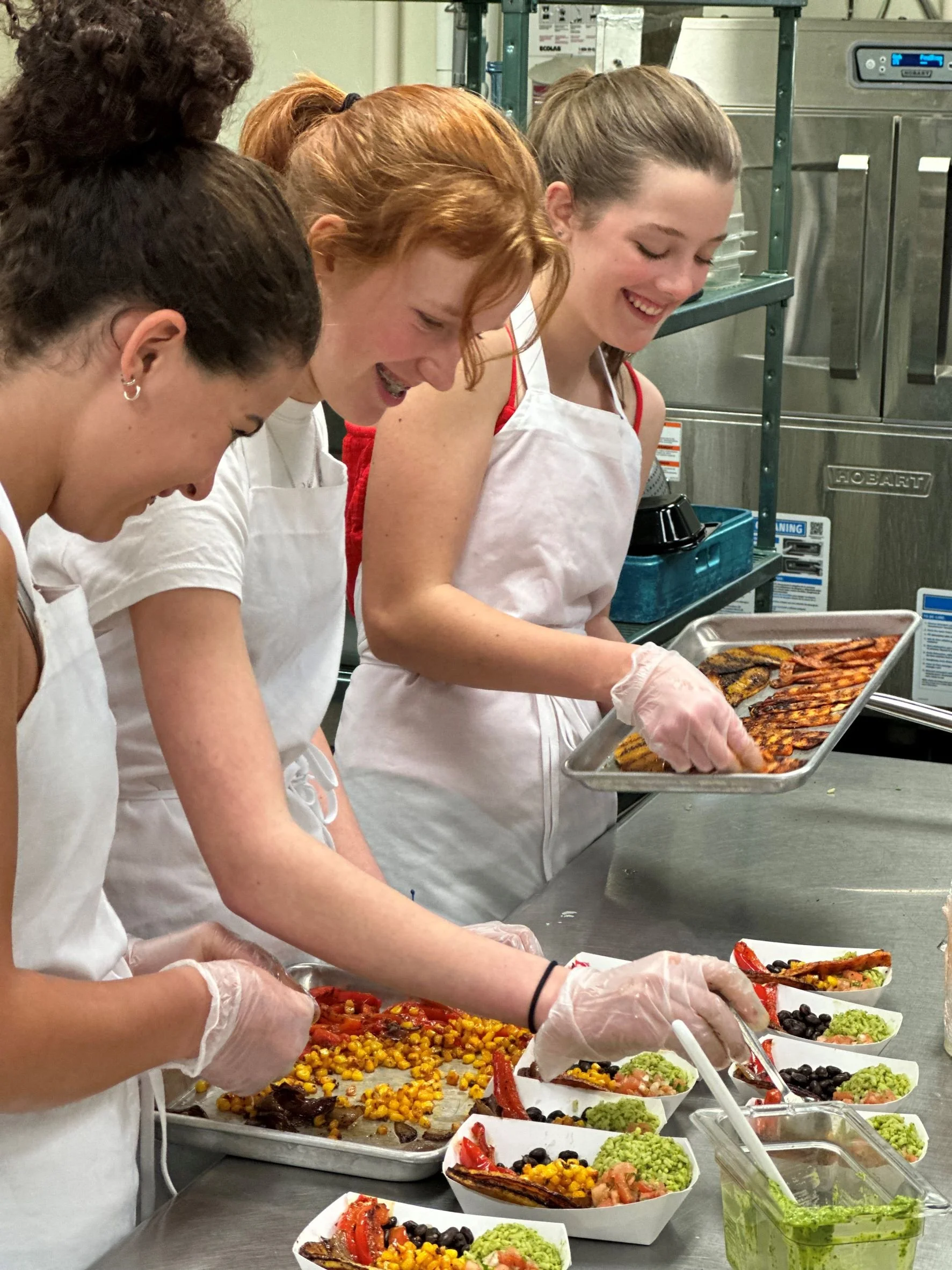   Making the Tiger Tail Burrito Bowl. Photo by Erika Dolan  