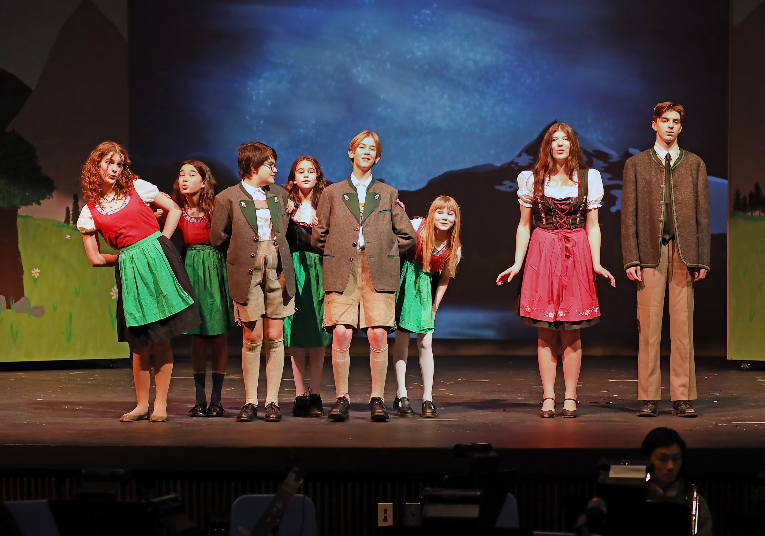   Harwood high school cast members Zoe Blackman (far left); Abby Holter and Christopher Cummisky (on right) rehearse with middle school actors (middle, left to right) Harmony Devoe, Robin Weigand, Ari Weigand, Tarin Askew and Desi Dahlgren. Photo by 