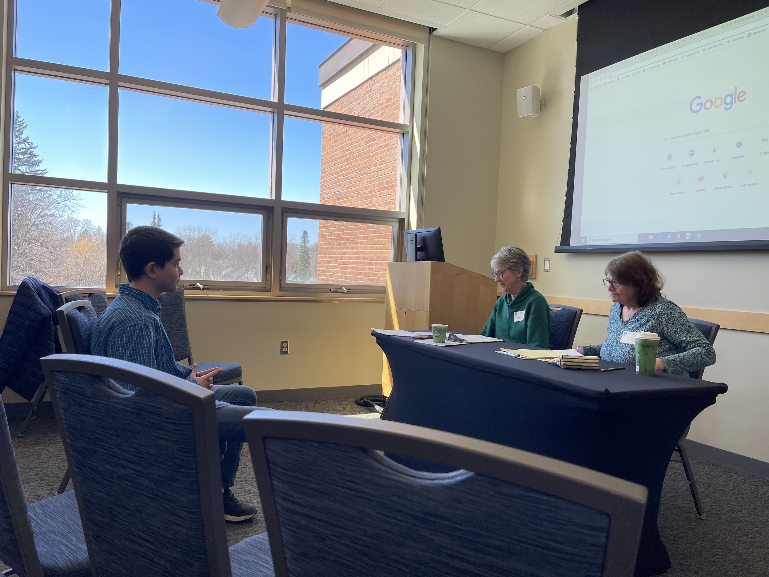   Will Clark presents his website project,  “Frontiers in History: The Manhattan Project”  to the judges. It would win first place. Photo by Korie Born  