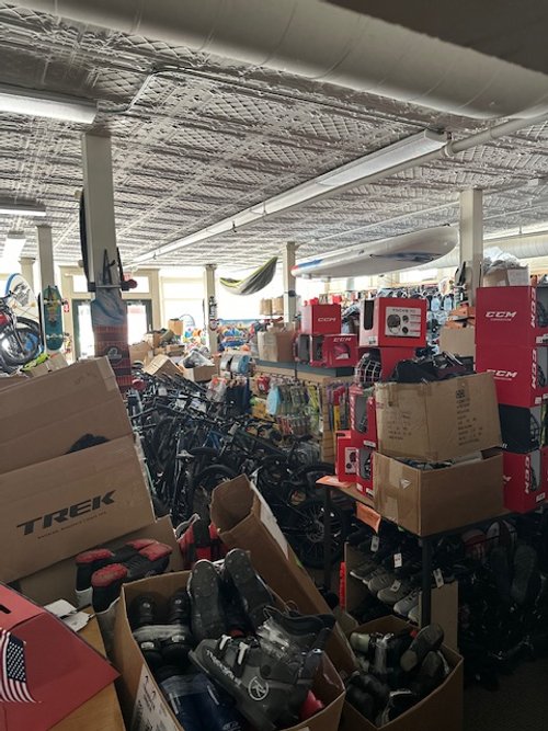  The retail space at Waterbury Sports is packed with inventory pulled up from the basement to avoid flood waters. Courtesy photo 