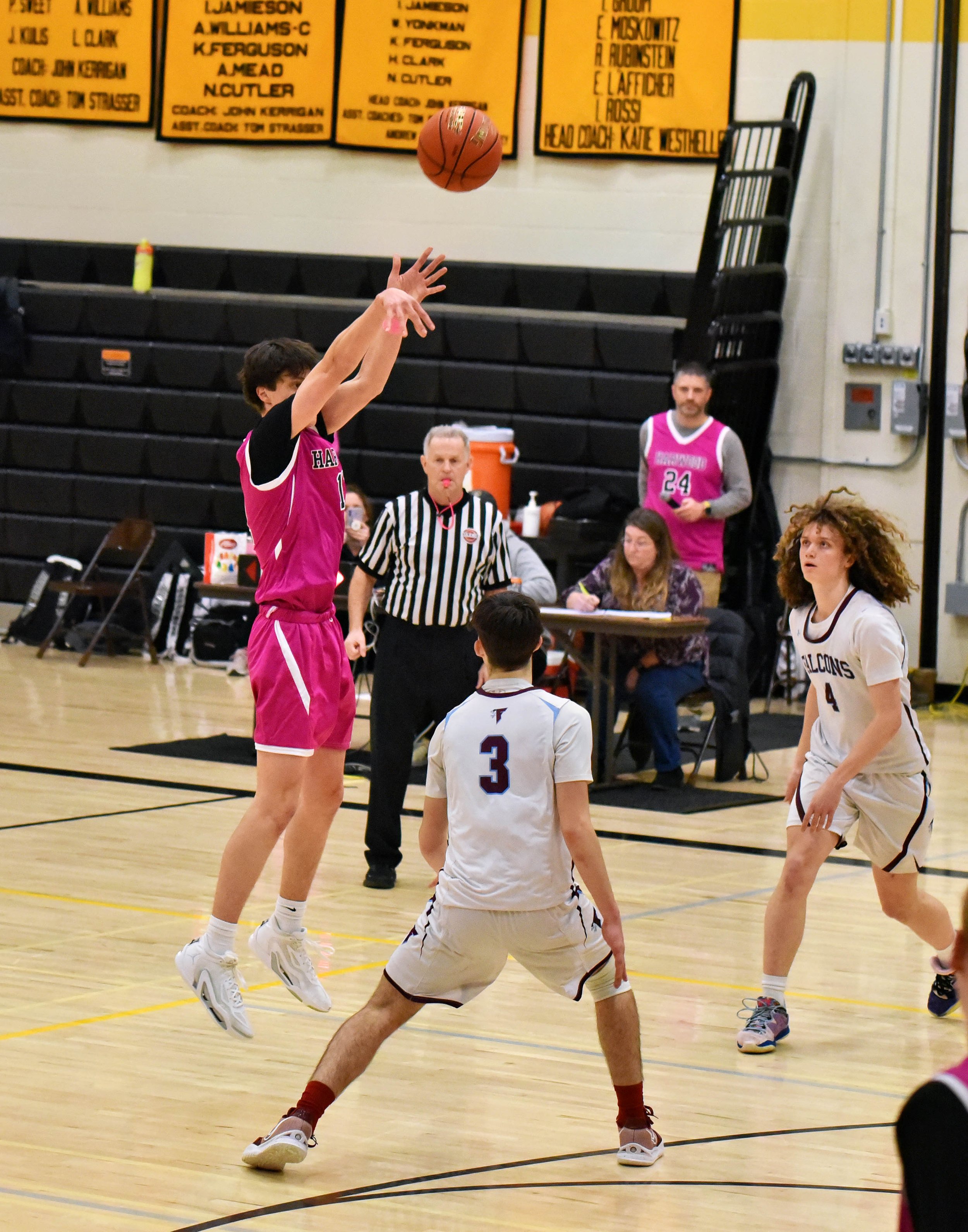  The shot as Tobey Bellows lands his 1,000th high school career point. Photo by Gordon Miller  