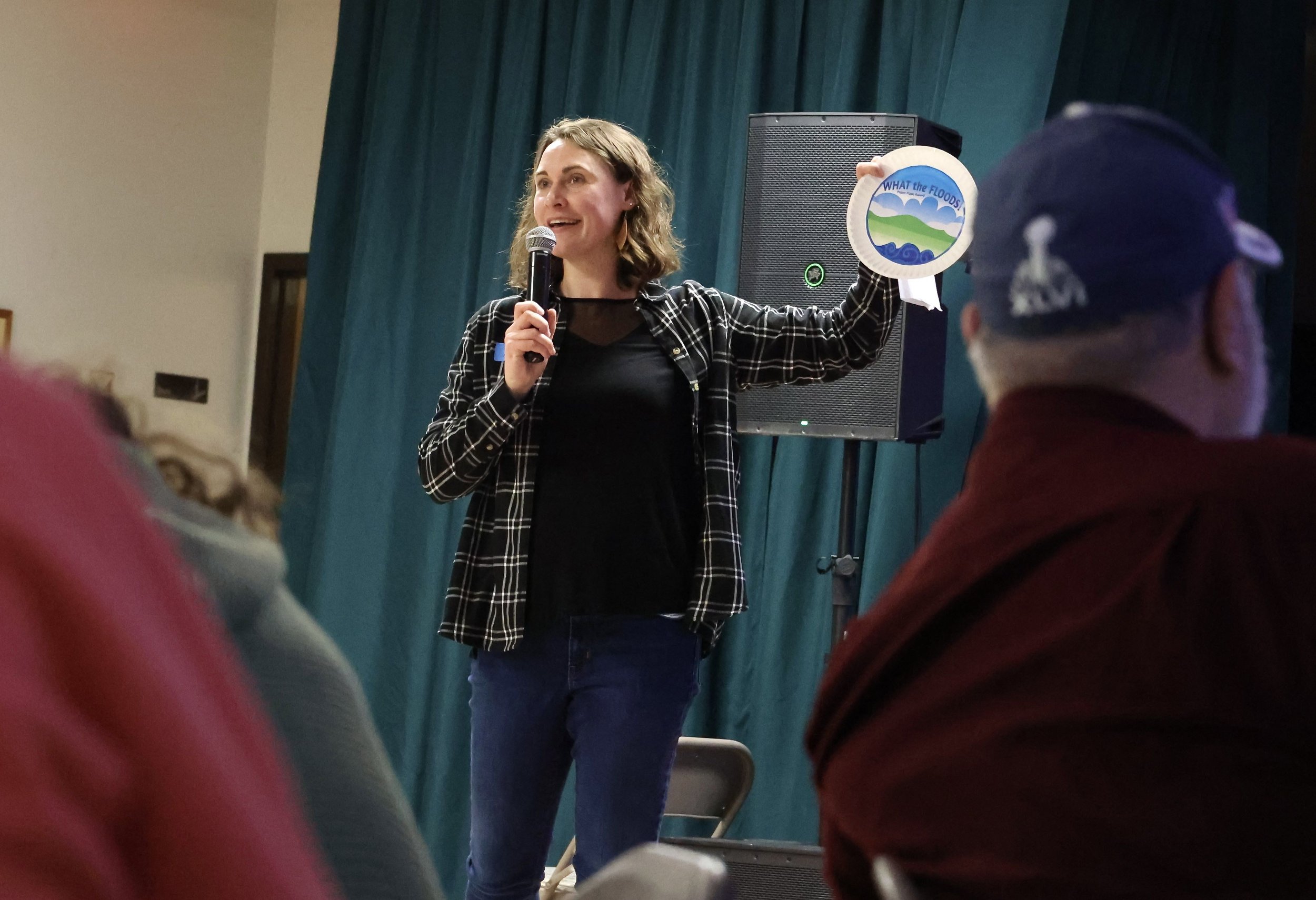  Waterbury Select Board member Alyssa Johnson explains the Paper Plate Award. Photo by Catherine Morrissey 