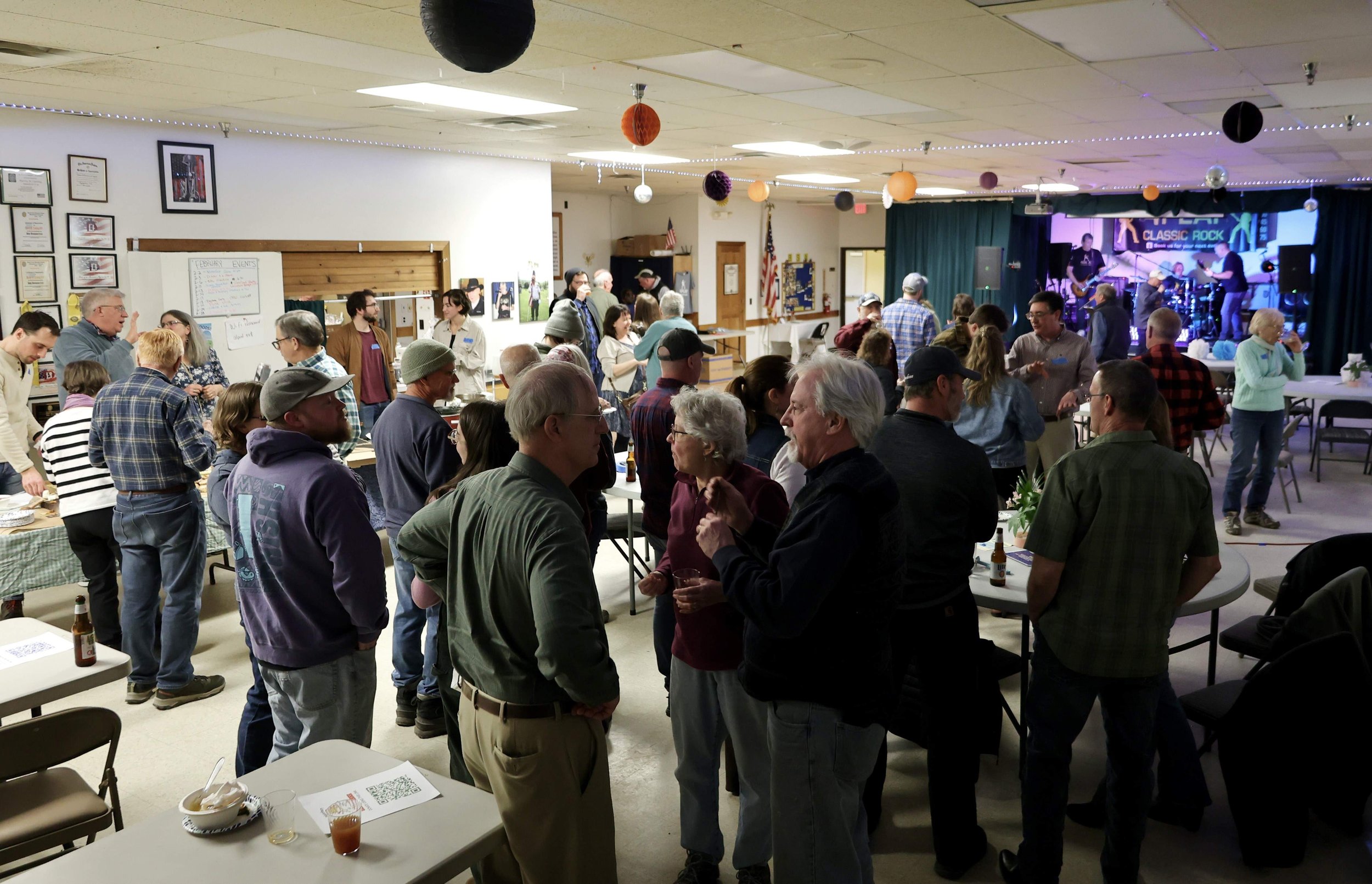  People mingling at the What The Floods(!) event hosted at the American Legion in Waterbury. Photo by Catherine Morrissey 