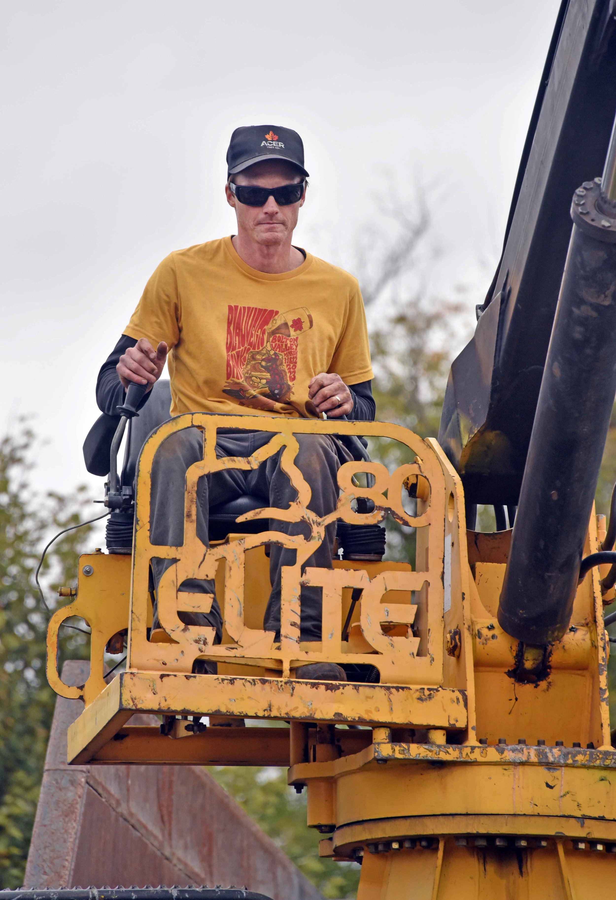  Jake Blauvelt runs the machine. Photo by Gordon Miller  