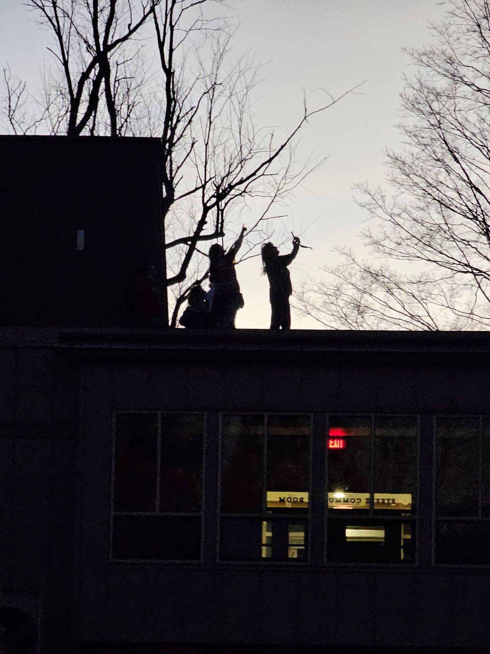   Richard Drill captured this scene of people atop the municipal offices in Waterbury.   