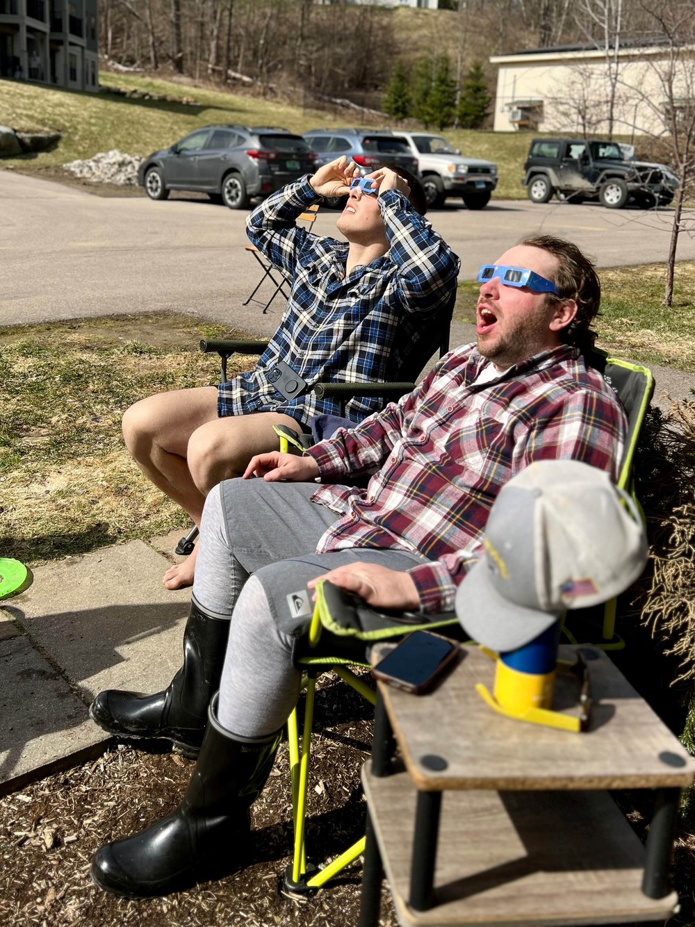   Kyle Smith and Daniel Mauclaire take in the eclipse on Kimberly Lane. Photo by Heather Smith  