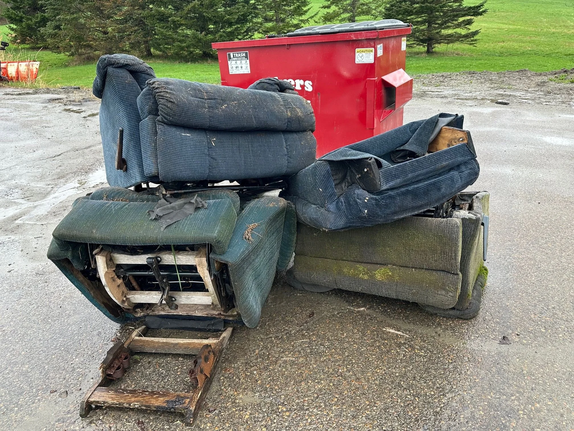  Broken recliner chairs left outside the town garage the day after Green Up. Photo by Lisa Scagliotti 