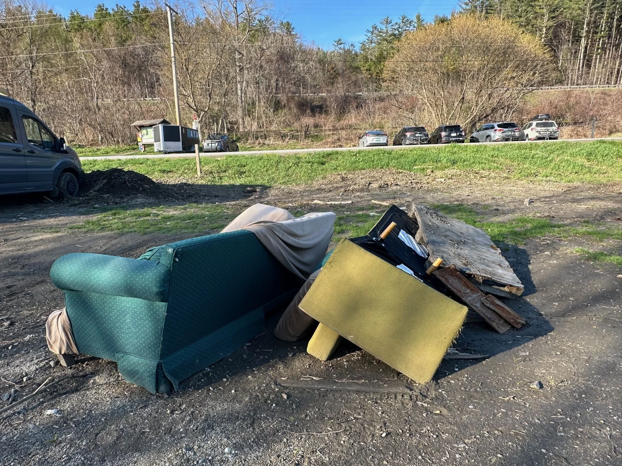  Two of four sofas dumped along River Road near the Ice Center. Photo by Lisa Scagliotti 