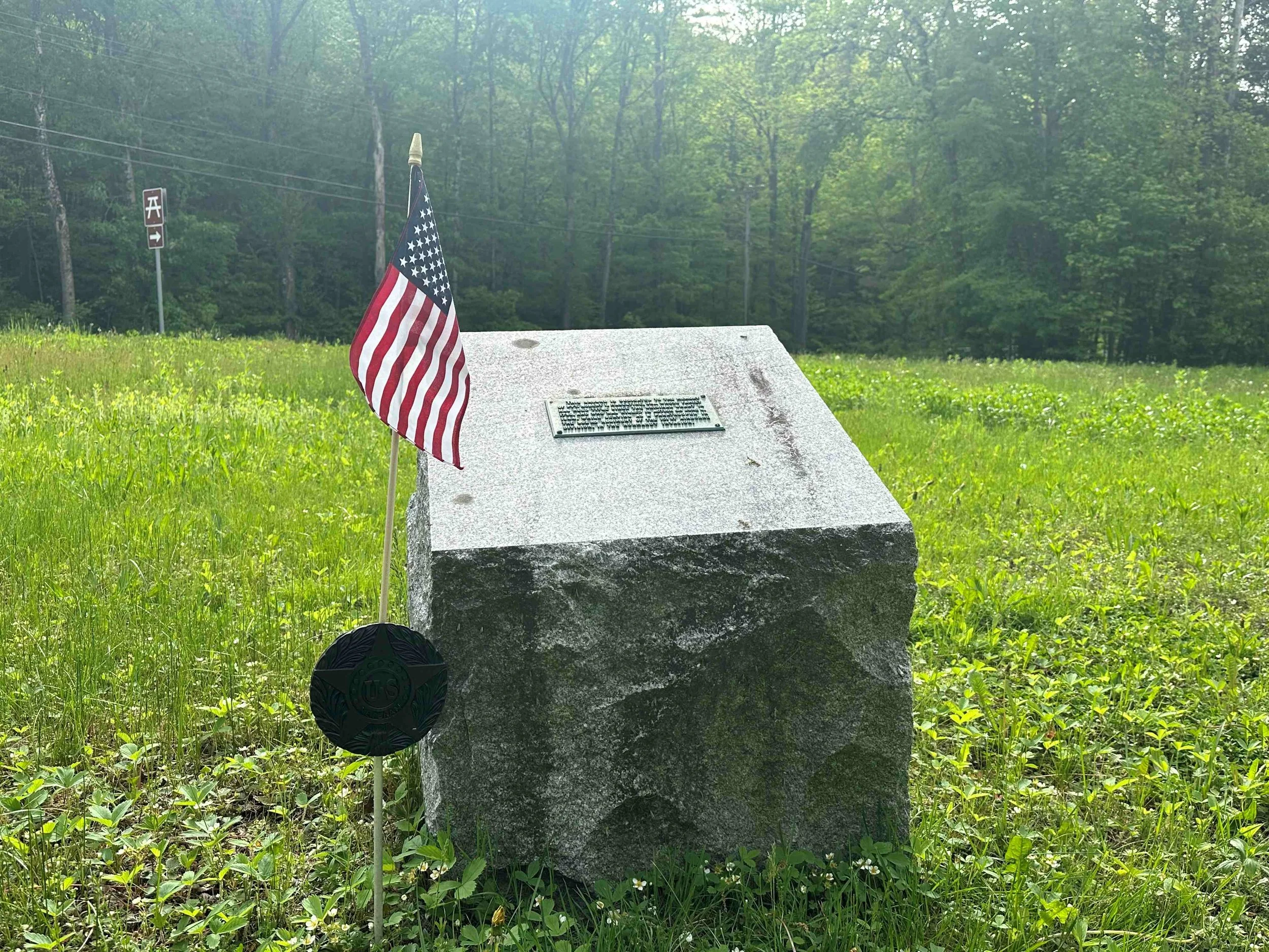 The monument to Pvt. Robert Haseltine in the small picnic park beside Rt. 2 in Moretown by the Palisades ledges of the Winooski River. Photo by Lisa Scagliotti