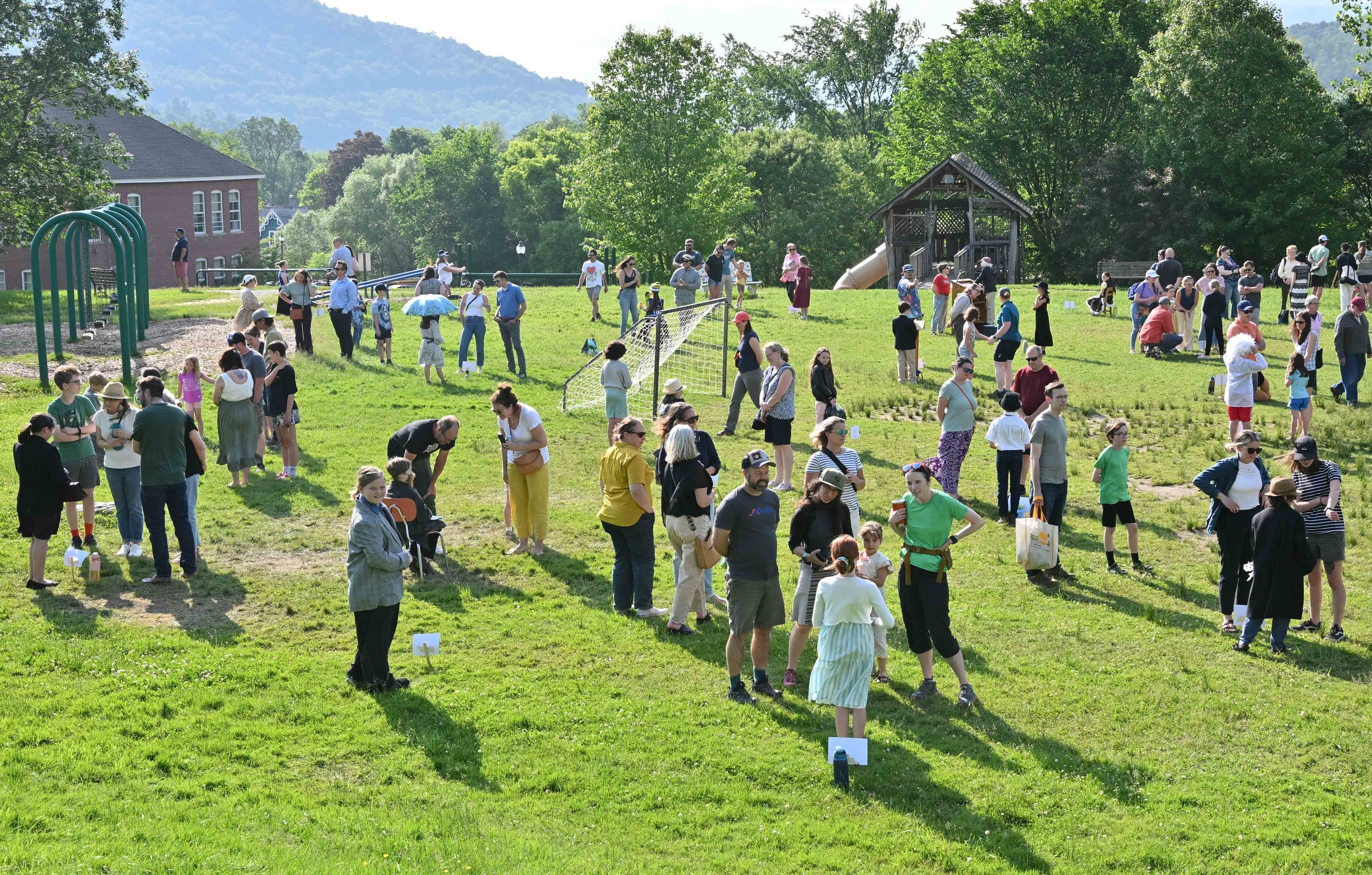 The school playground provides a perfect setting for the students to spread out for their presentations. Photo by Gordon Miller