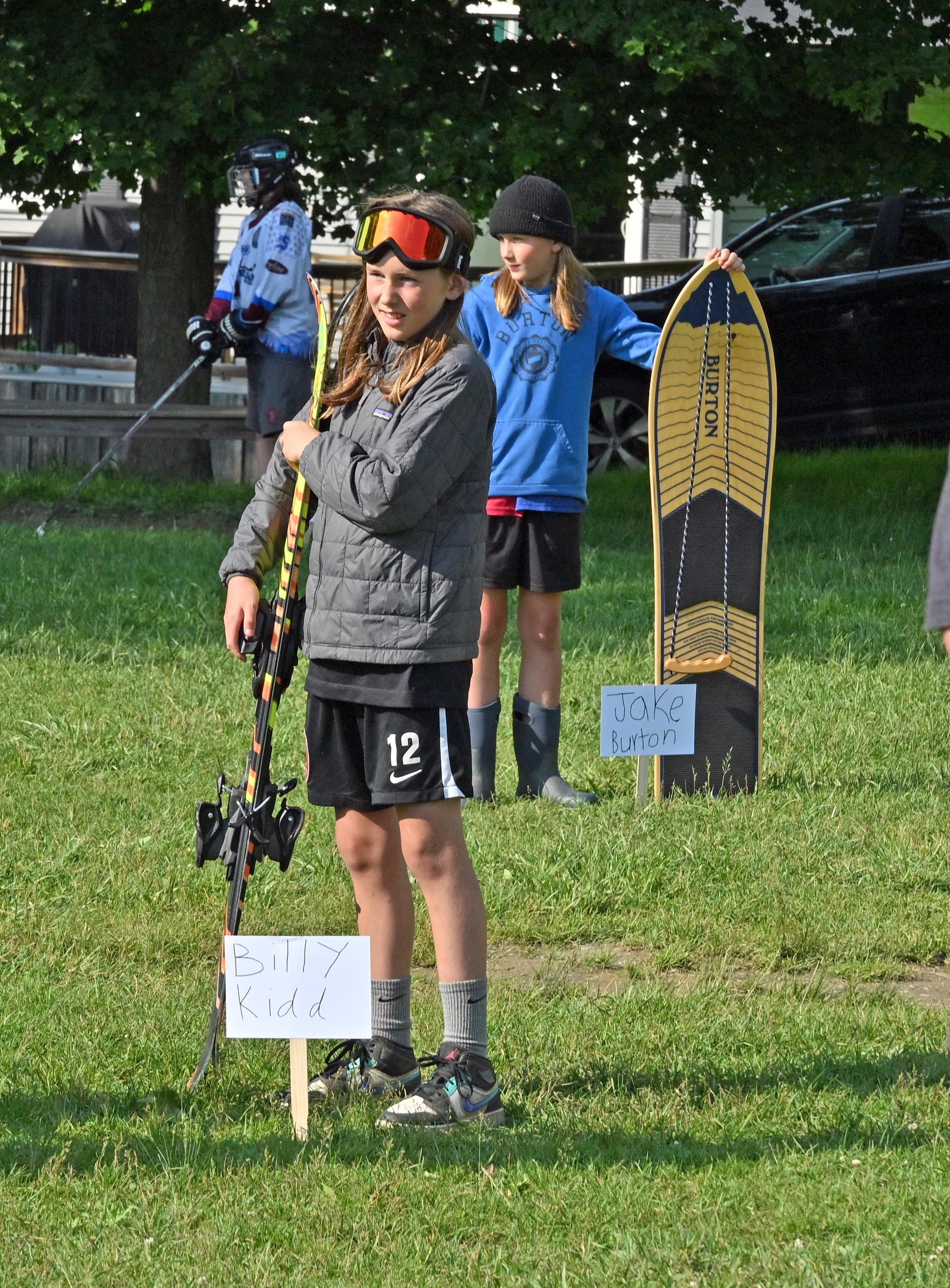 Skier 'Billy Kidd' and snowboarder 'Jake Burton' wait for their next audience members to approach. Photo by Gordon Miller 