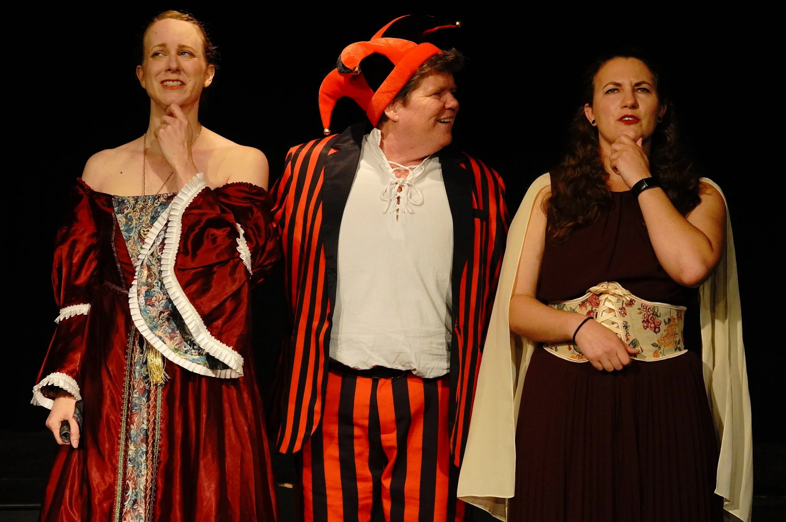   Touchstone, (center, played by Susan Loynd), challenges Rosalind, (Stefanie Seng, left) and Celia (Kohl Comtess, right) to 'find their beards' in a scene from 'As You Like It,' at the Valley Players Theater. Photo by Wayne Fawbush  