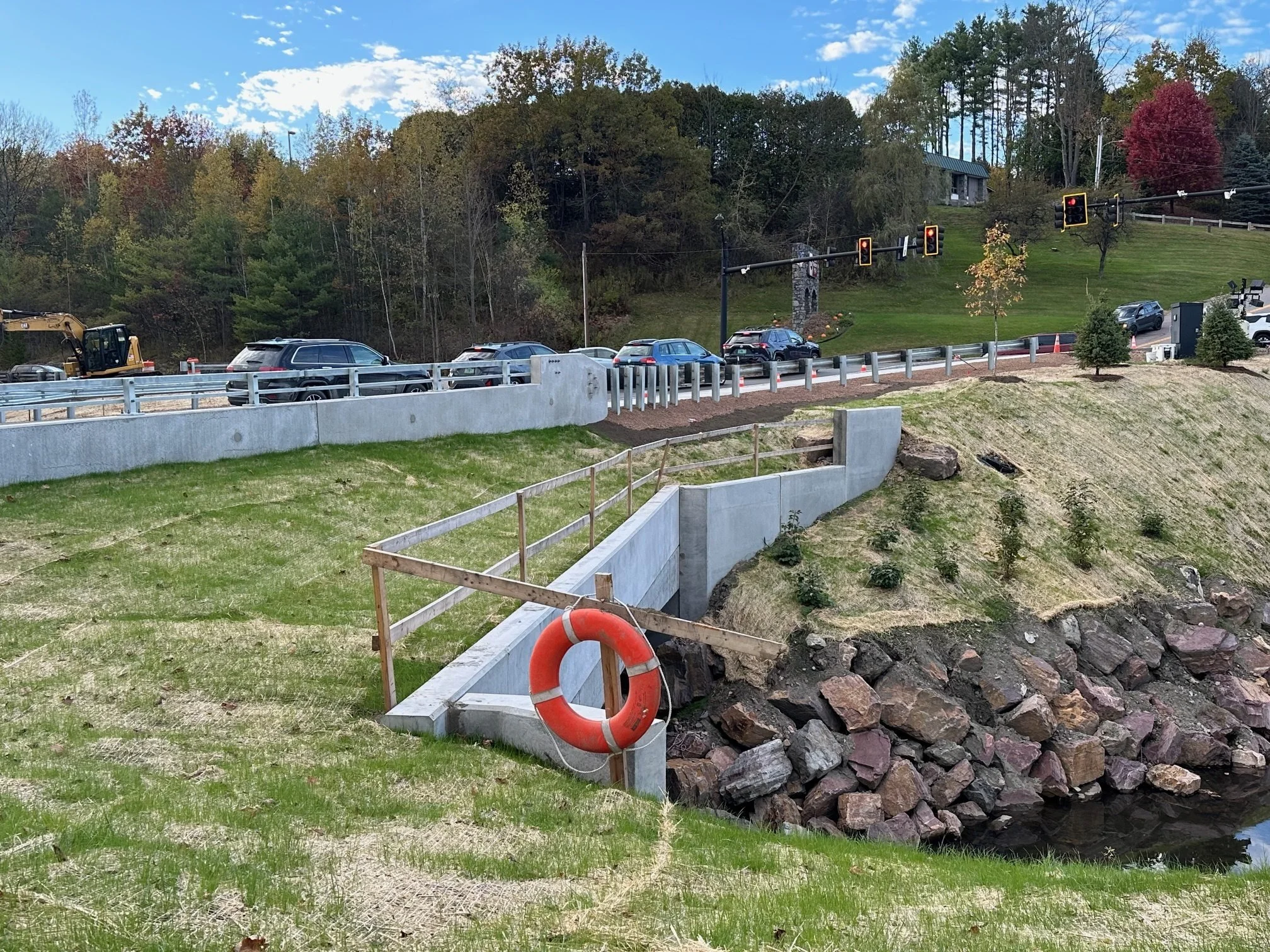  The wooden handrail atop the buried structure of the bridge will be removed when the project is complete. Photo by Lisa Scagliotti  