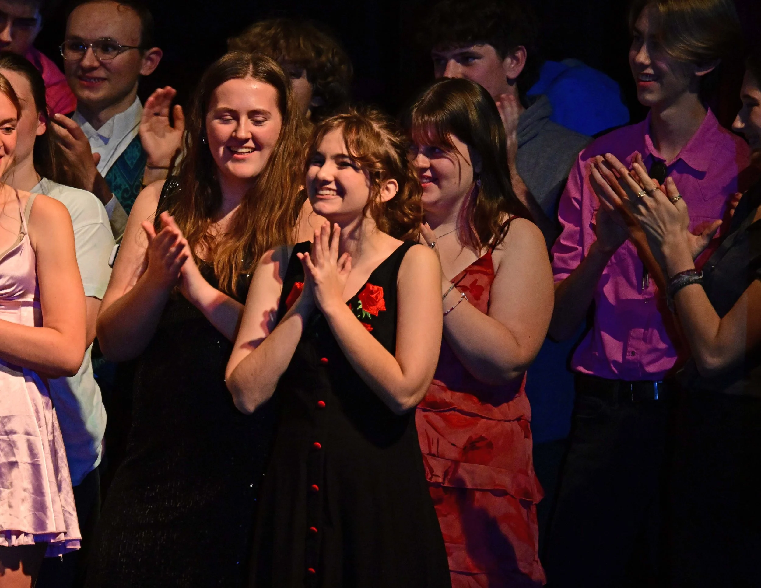  Student musicians cheer each other on.&nbsp;Photo by Gordon Miller 