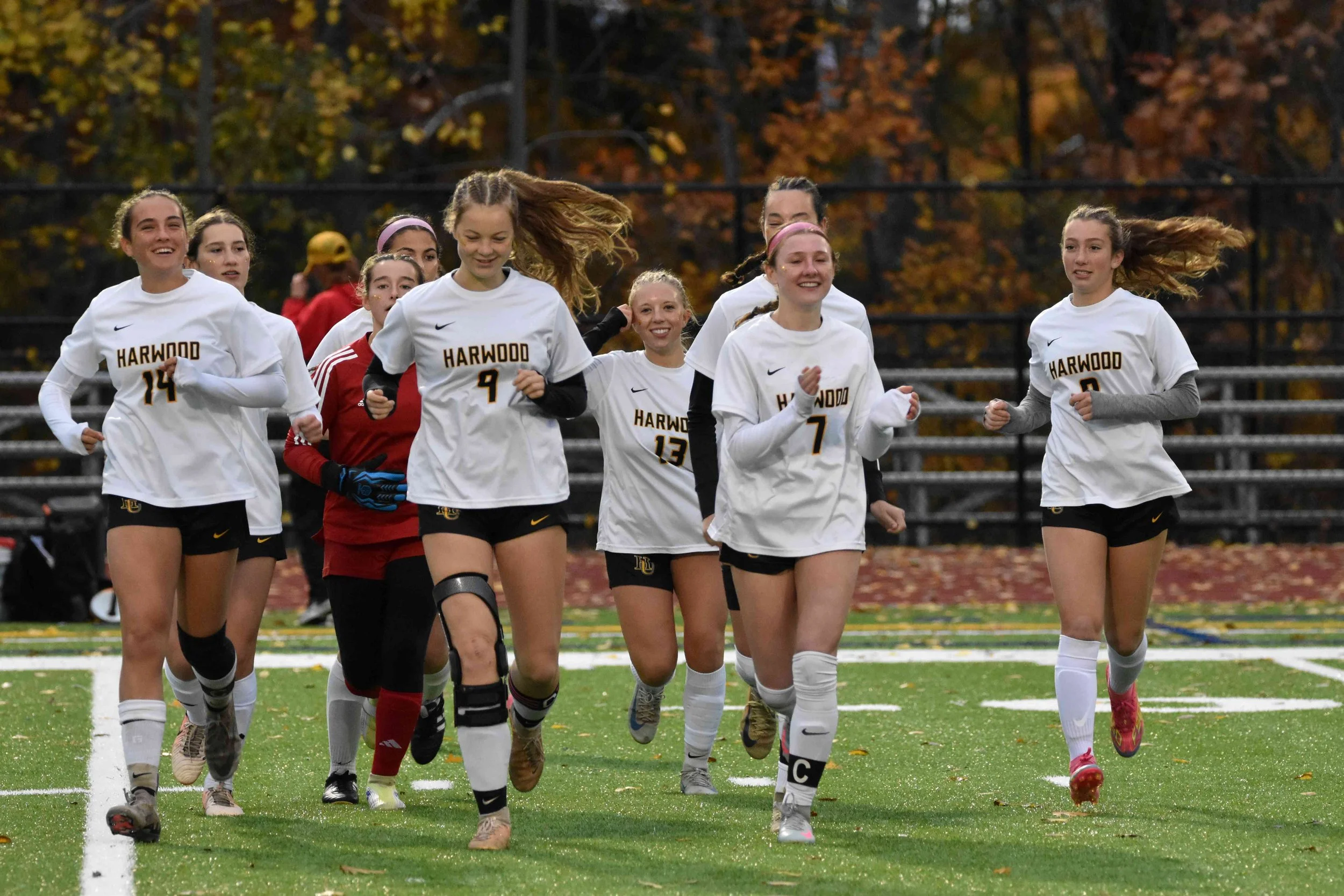   Harwood girls take to the field at the start of the D-II championship match vs. Rice Memorial on Oct. 31 at Burlington High School.&nbsp;Photo by Angela Nadeau  