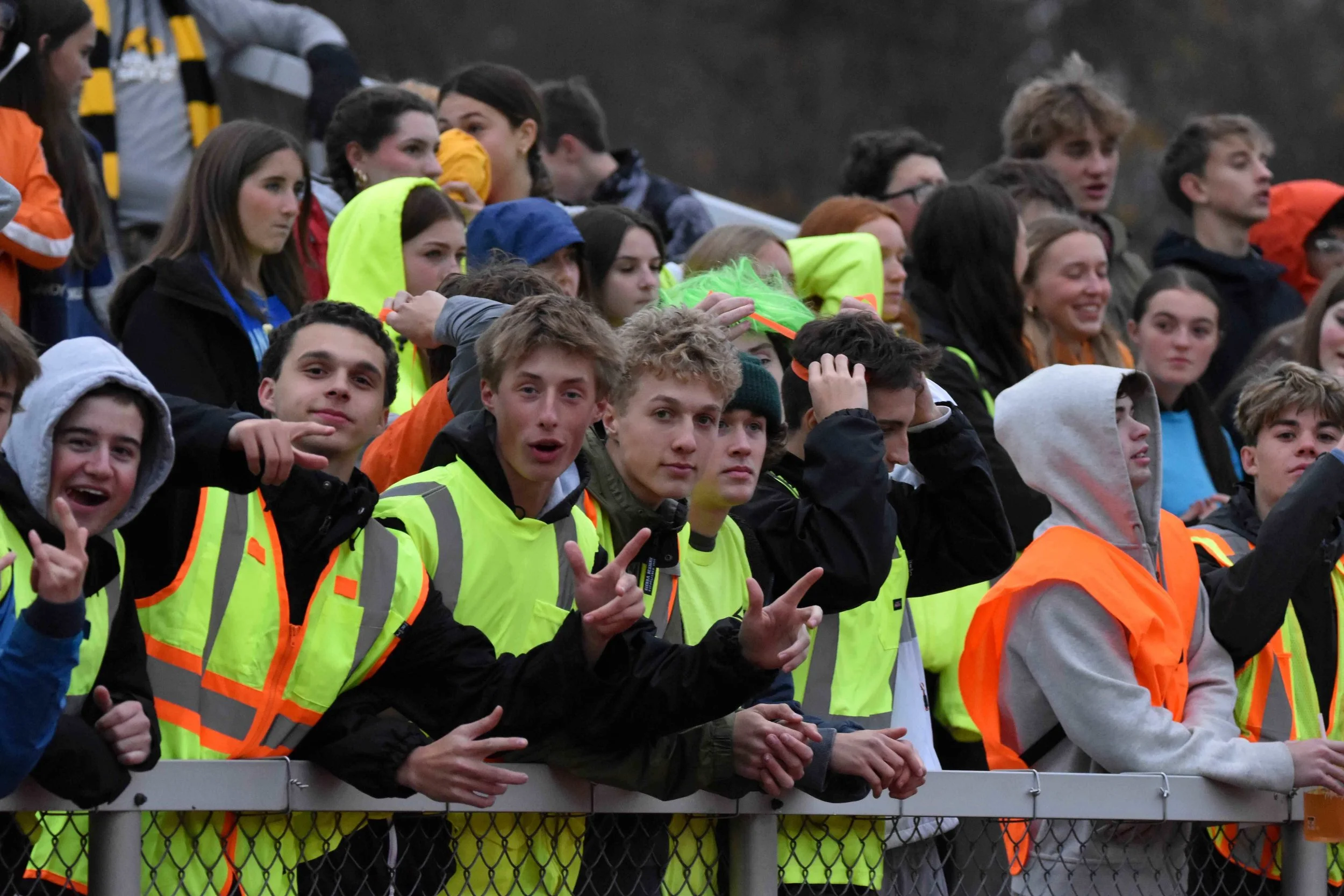   Harwood fans came in neon vests after the team chose neon for their game theme.&nbsp;Photo by Angela Nadeau  