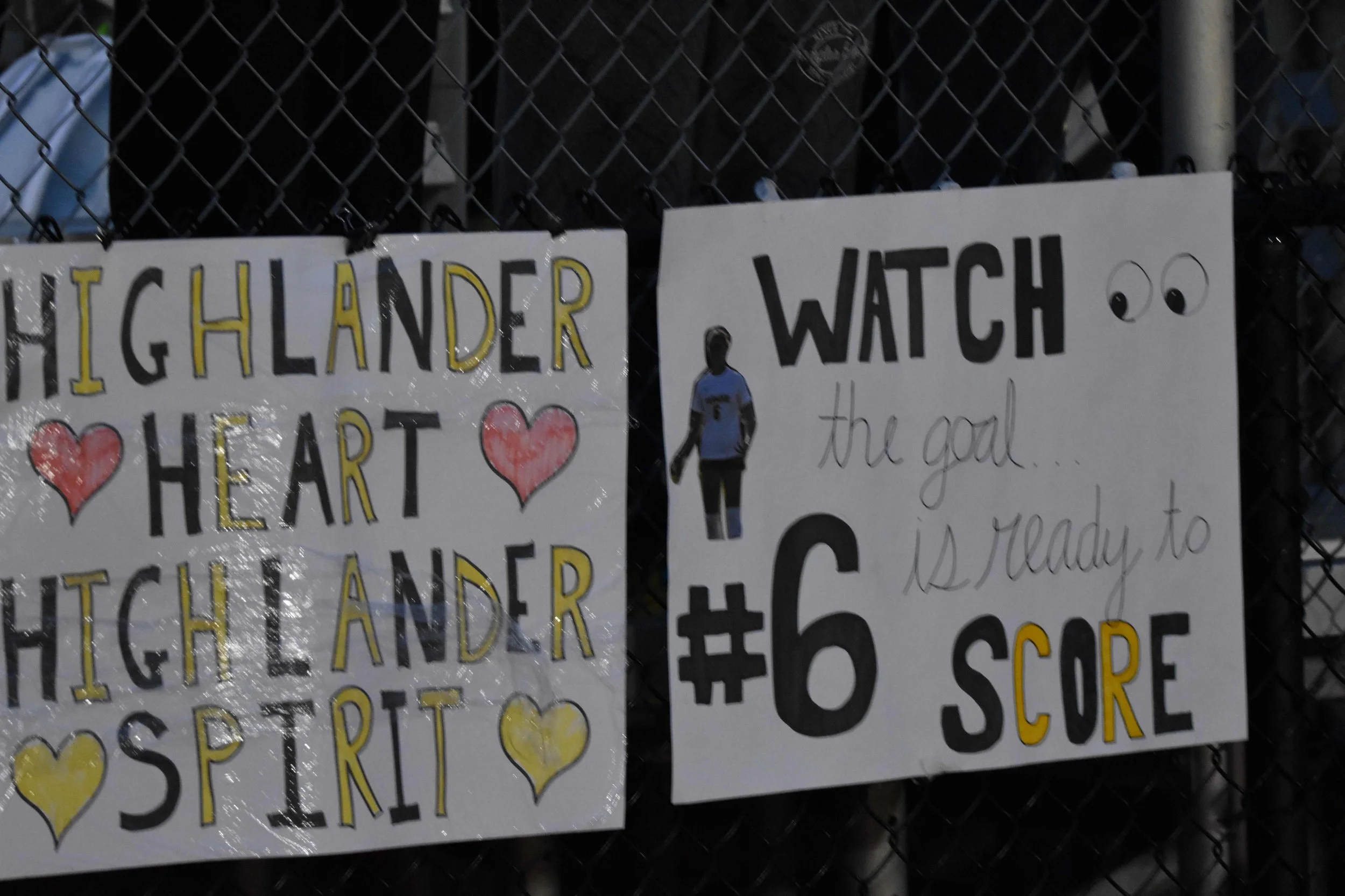   A fan sign gives sophomore Adelaide Chalmers a shoutout.&nbsp;Photo by Angela Nadeau  