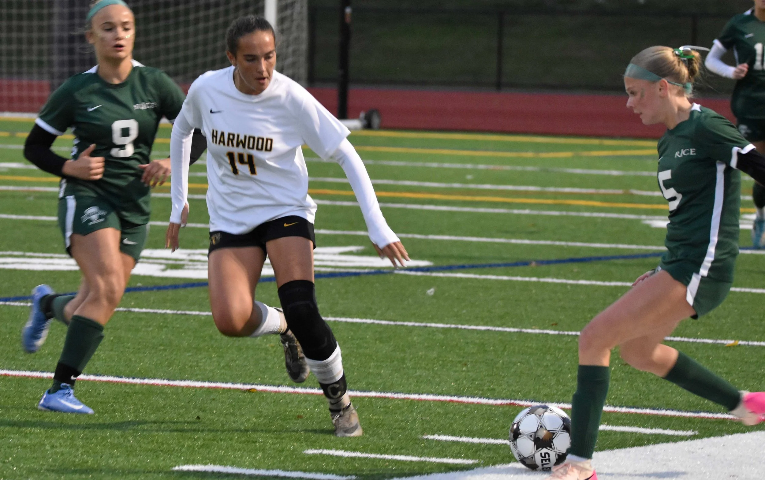   Senior Roanha Chalmers in the center of the action.&nbsp;Photo by Angela Nadeau  