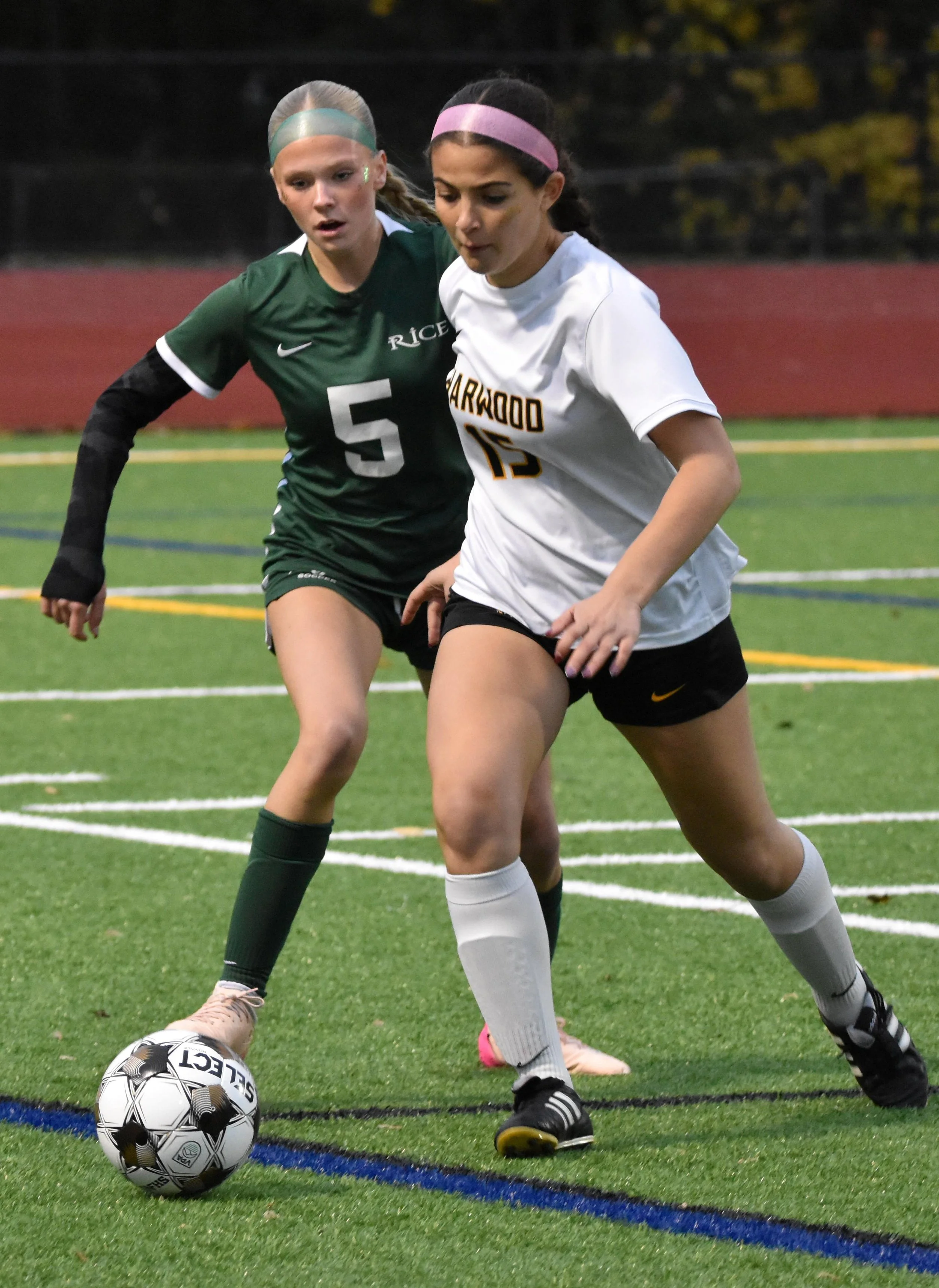   Junior Sophia DeSanto keeps her eye on the ball.&nbsp;Photo by Angela Nadeau  