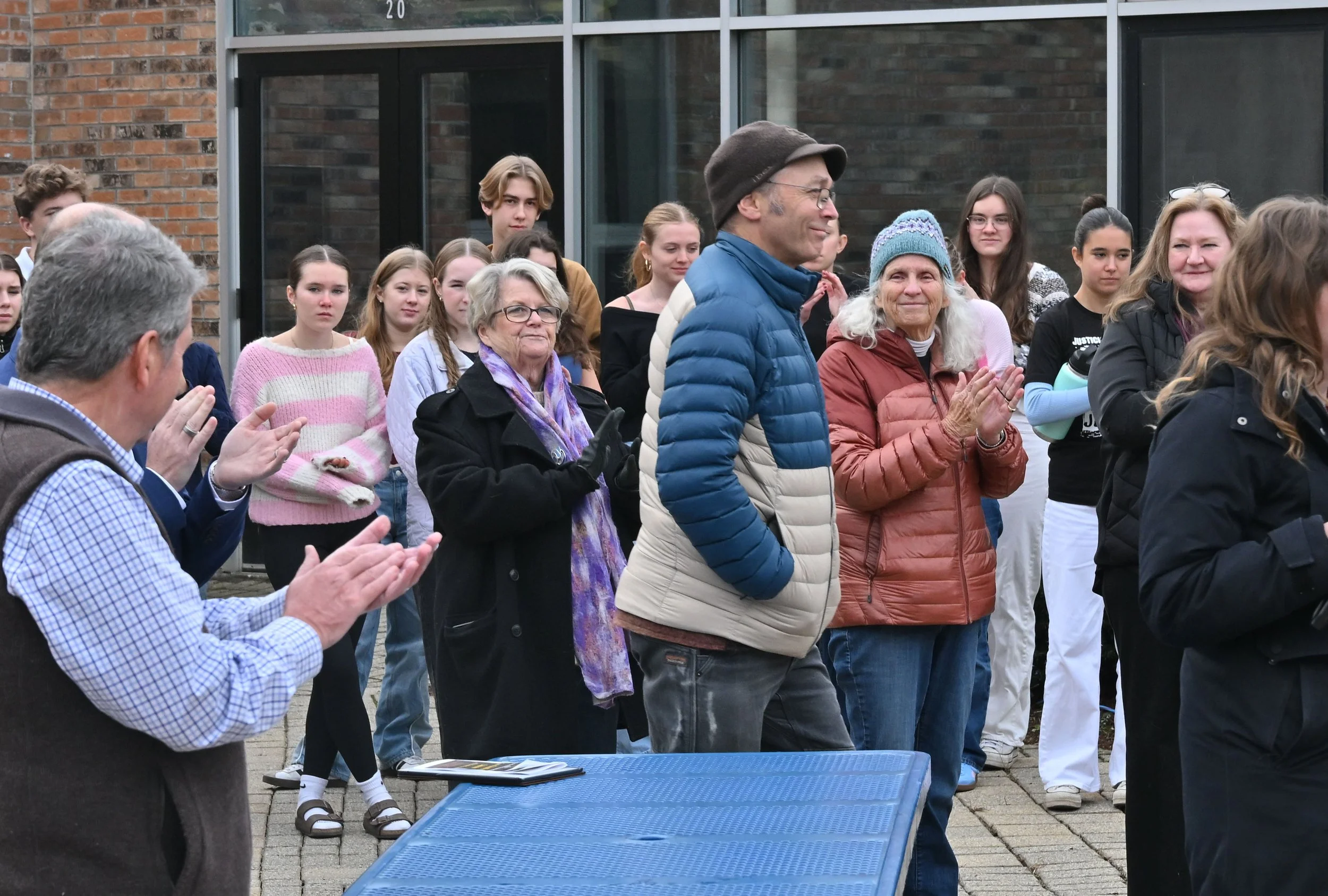   Applause for Red Hen Baking Co. owner Randy George as he steps to the microphone to share remarks. Photo by Gordon Miller  