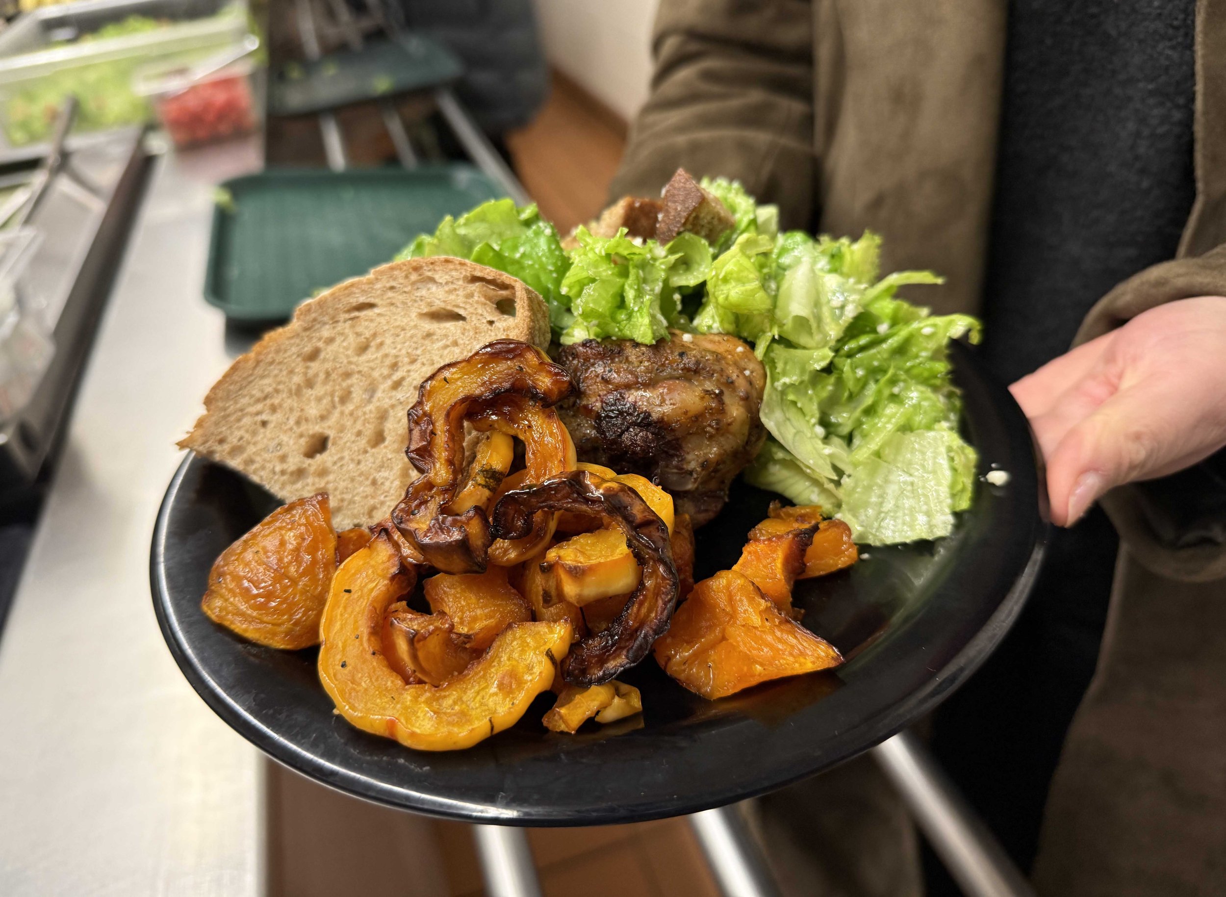  Lunch included Harwood Food Service's signature roasted squash, chicken or tofu, Caesar salad and Red Hen bread. Photo by Gordon Miller 