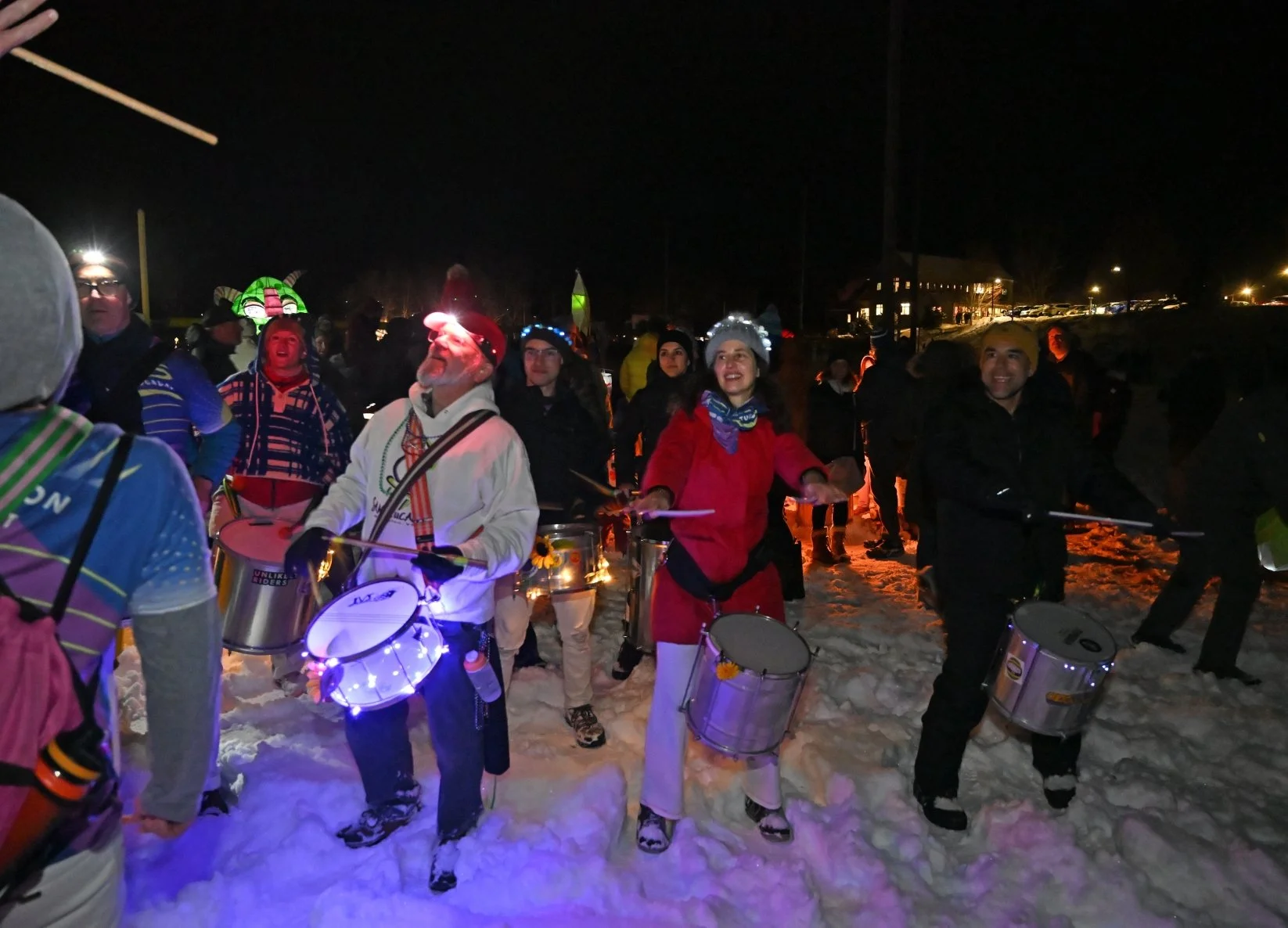   Burlington street band Sambatucada is a perennial entry in the River of Light Parade,&nbsp;providing a beat to dance and march to. Photo by Gordon Miller&nbsp;  