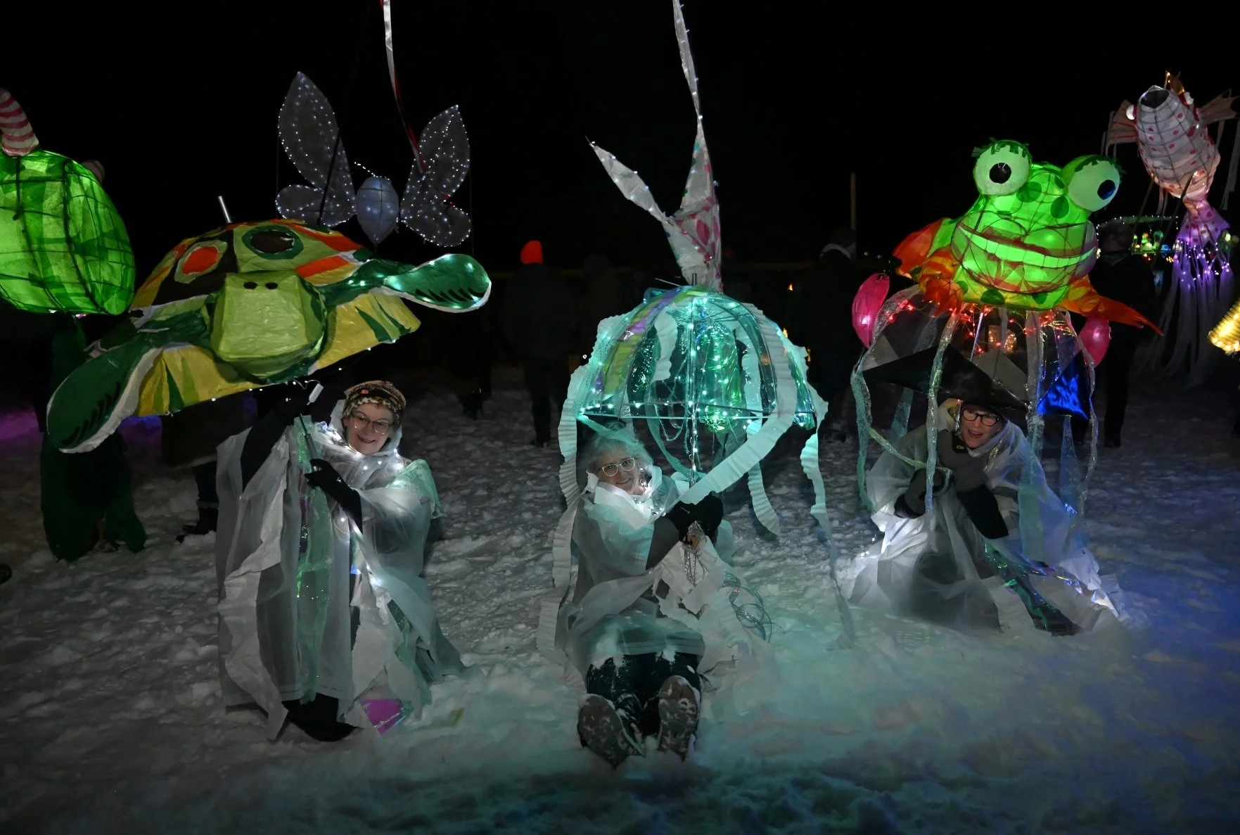   Parade leaders Mame McKee, MK Monley and Sarah-Lee Terrat and their large lanterns in 2024. Photo by Gordon Miller&nbsp;  