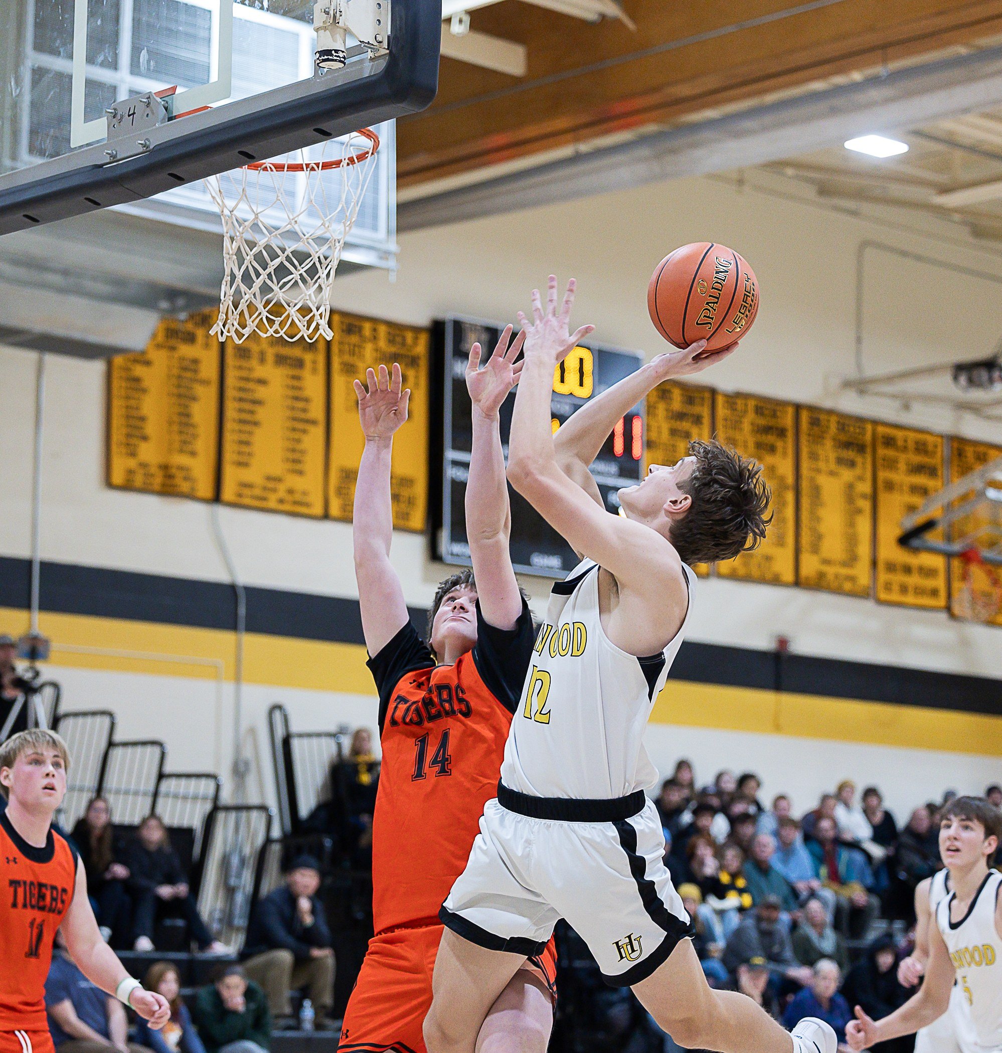  Senior Steele Nelson goes up for a shot. Photo by Sarah Milligan  