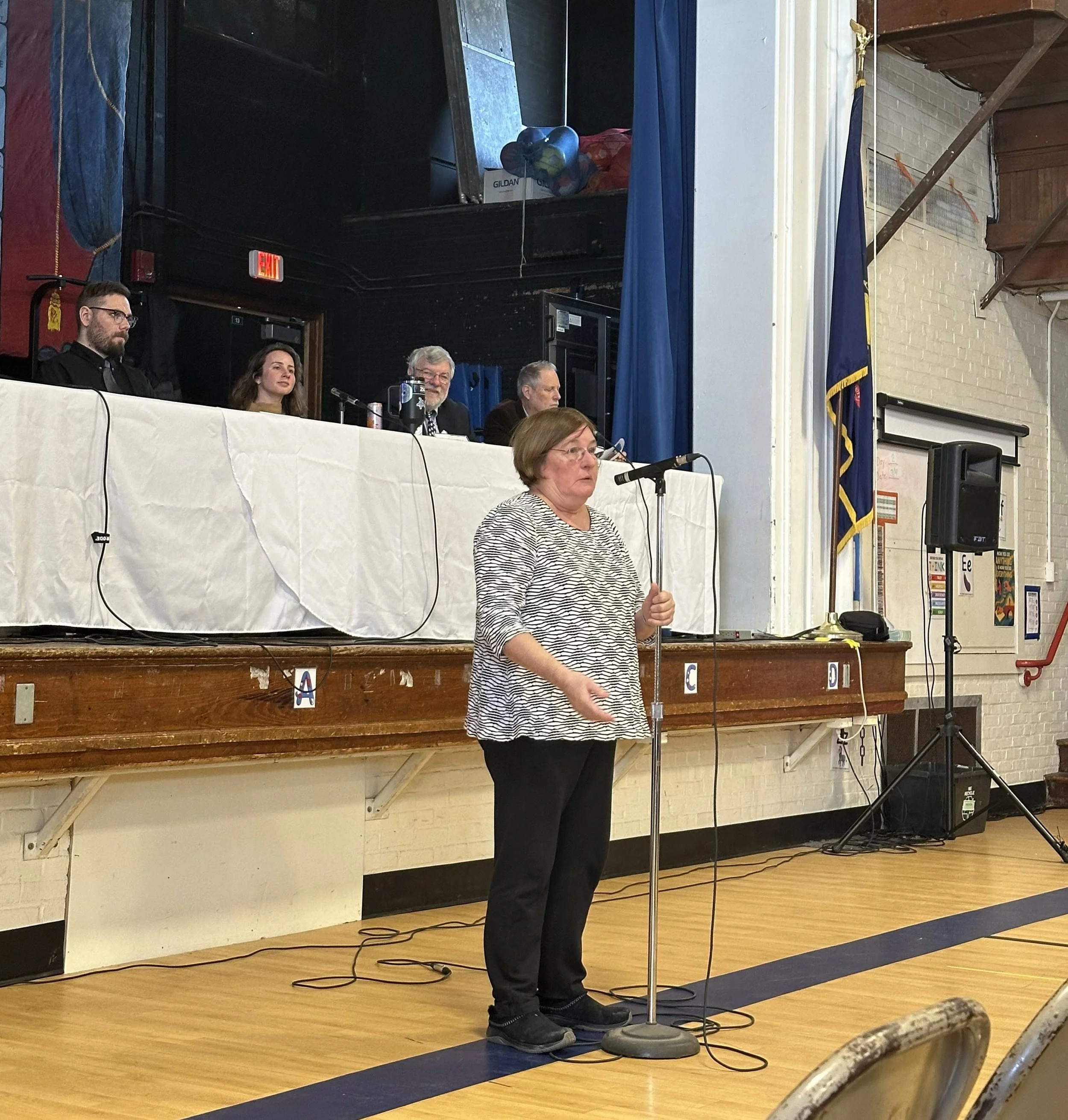   Kathryn Grace comments during town meeting. Photo by Lisa Scagliotti  