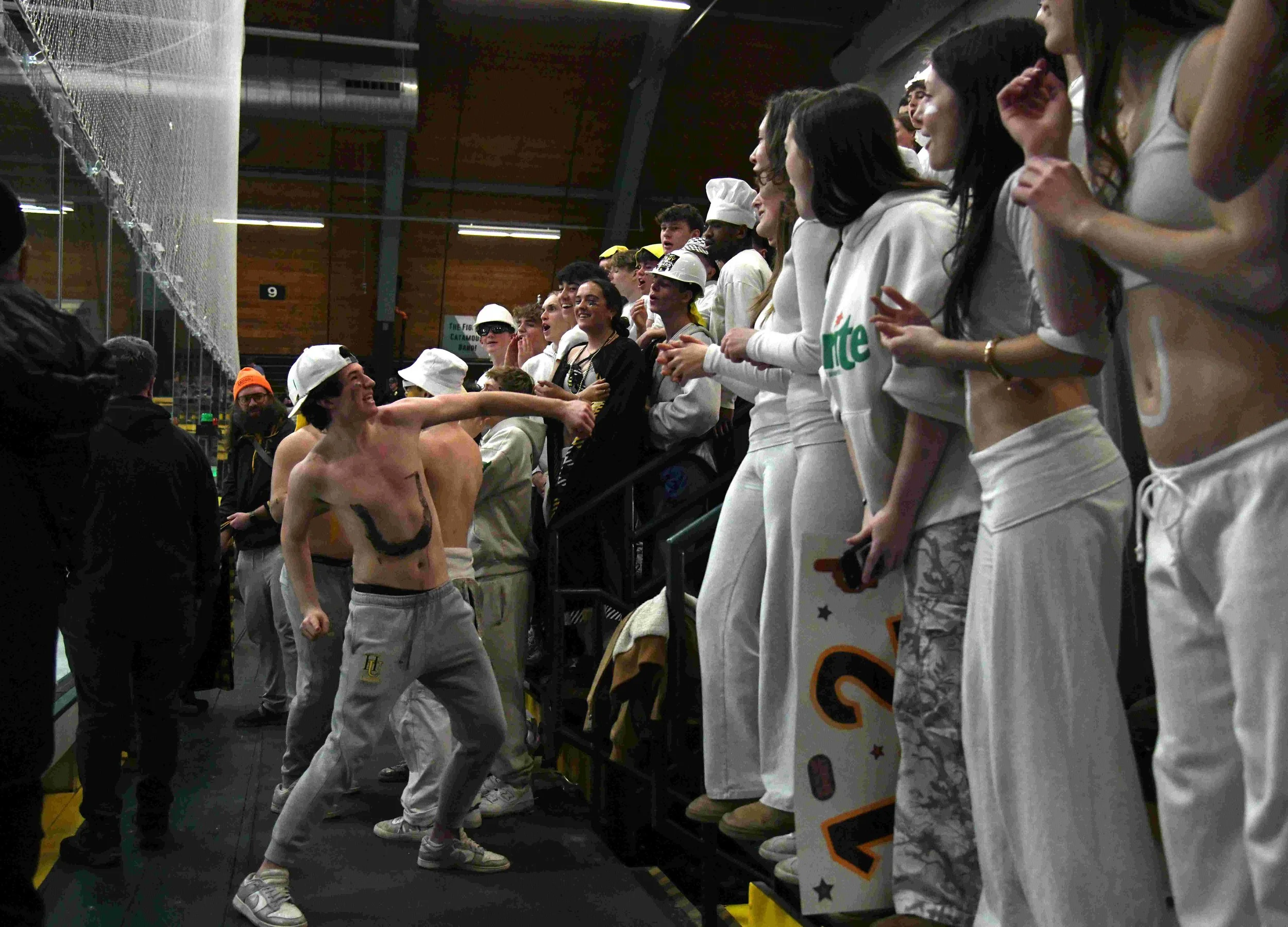  Dress theme for the game: “White Out.” Photo by Gordon Miller 