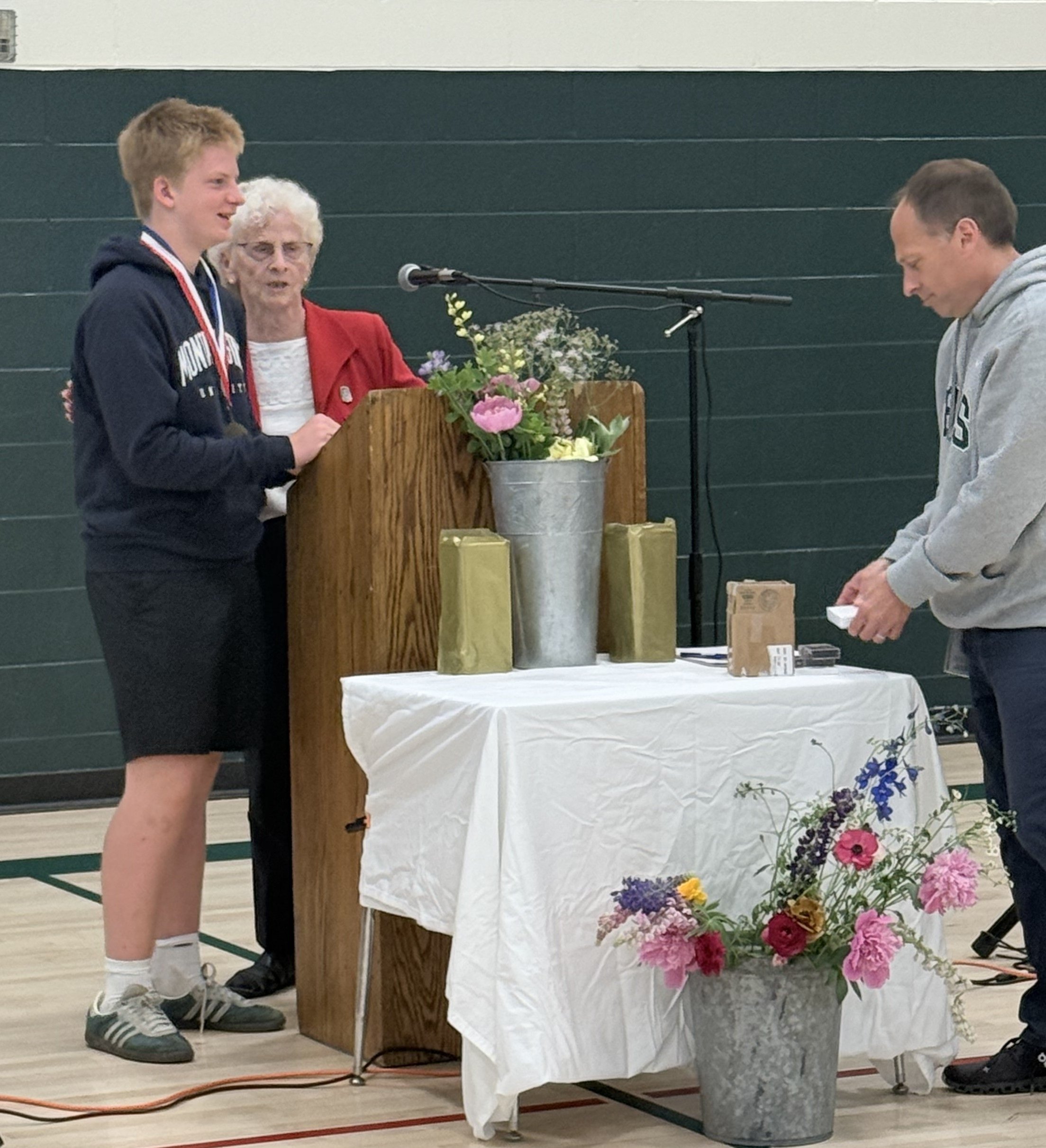  Sam Phillips receives an American Legion Auxiliary Award. Photo by Meg Libby 