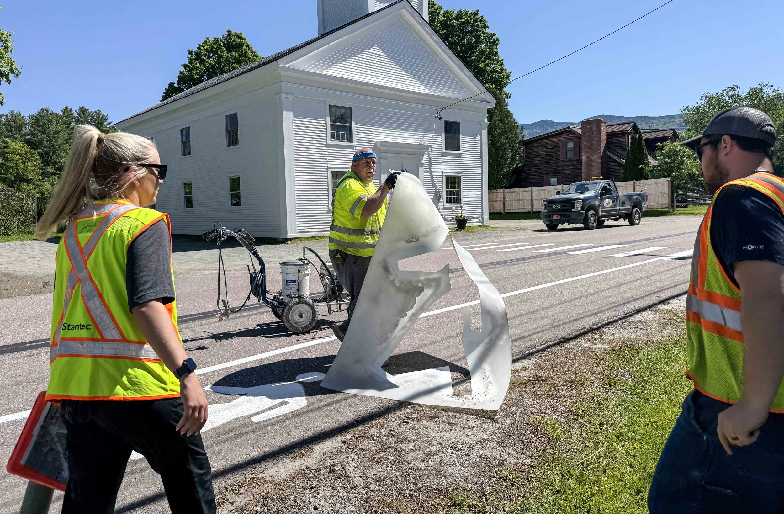  New markings are painted to delineate a path for pedestrians. Photo by Gordon Miller 