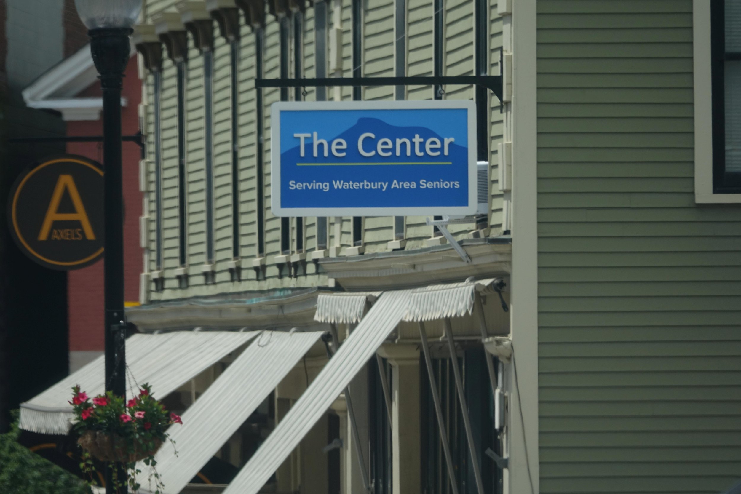 Senior center gets a fresh sign, invites more to visit