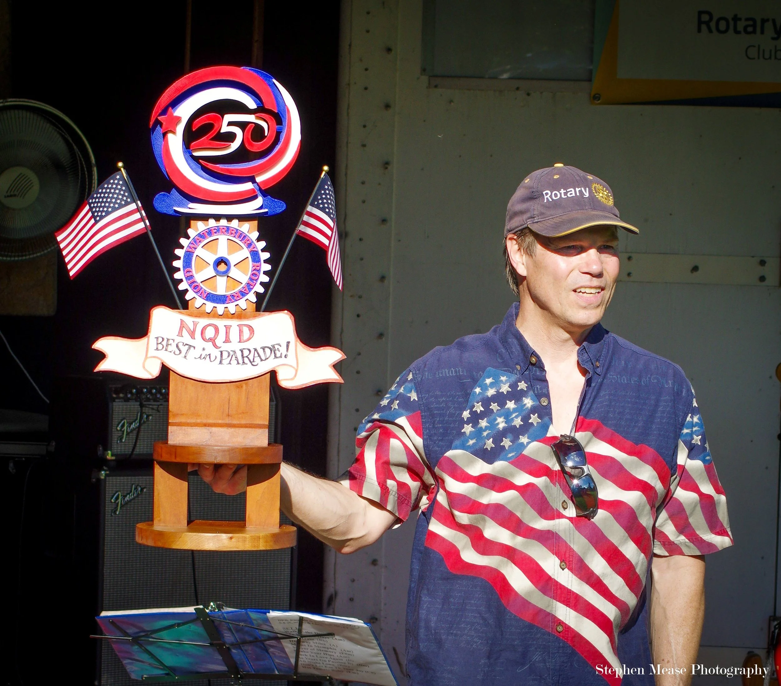  Rotarian NQID organizer Dan McKibben with the Best in Parade trophy. Photo by Stephen Mease 