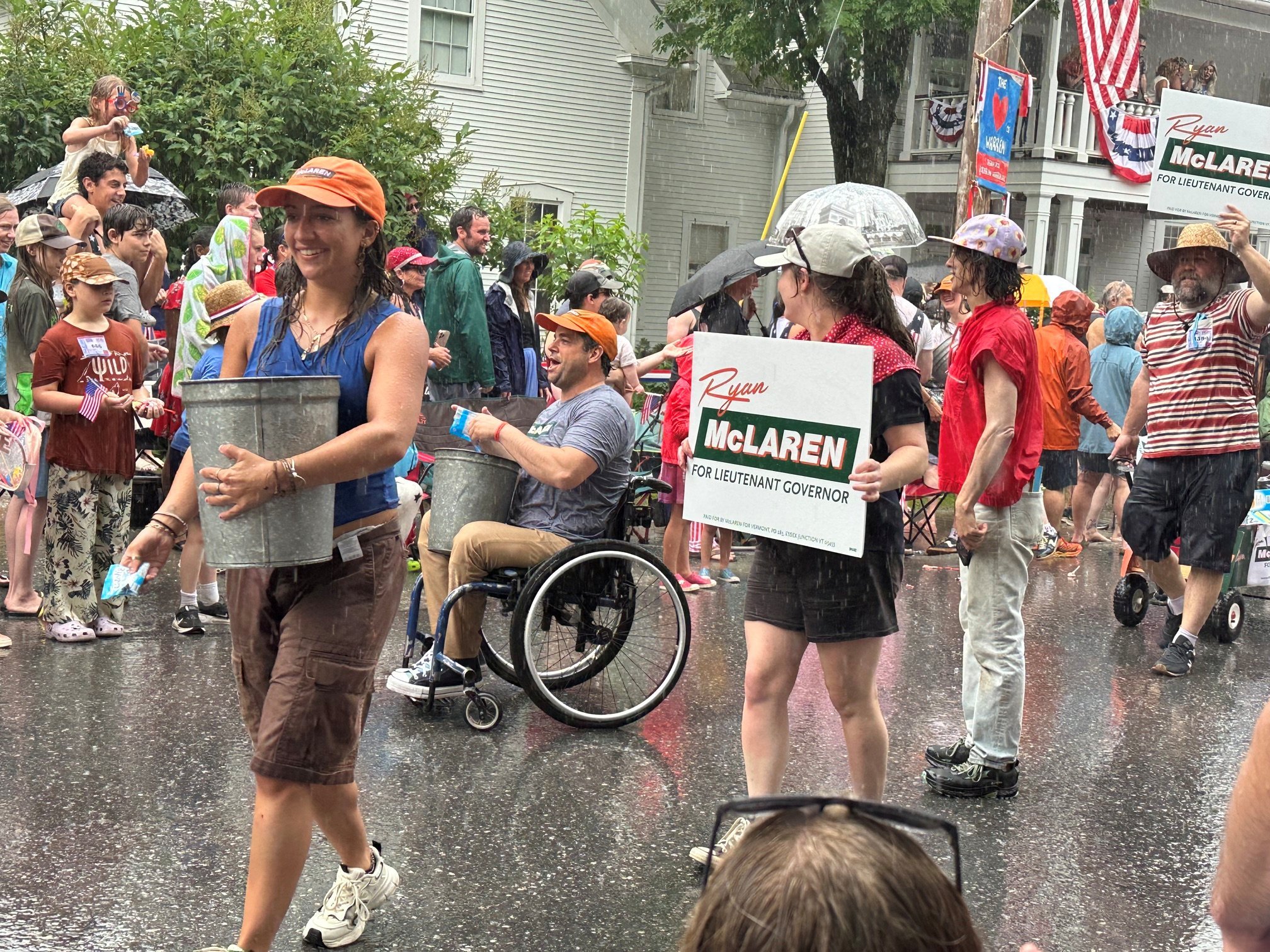   Democratic lieutenant contender Ryan McLaren and supporters join the parade. Photo by Lisa Scagliotti  