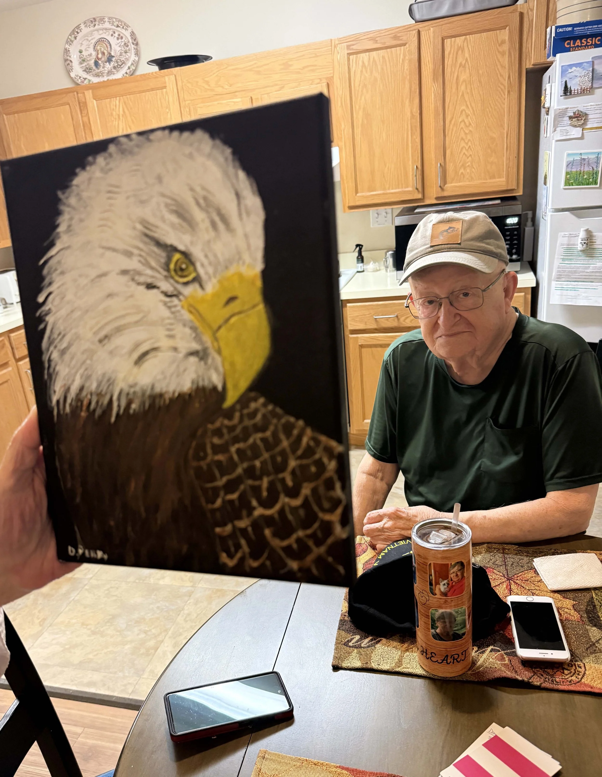  Doug Perry shares more of his art. Photo by Gordon Miller   