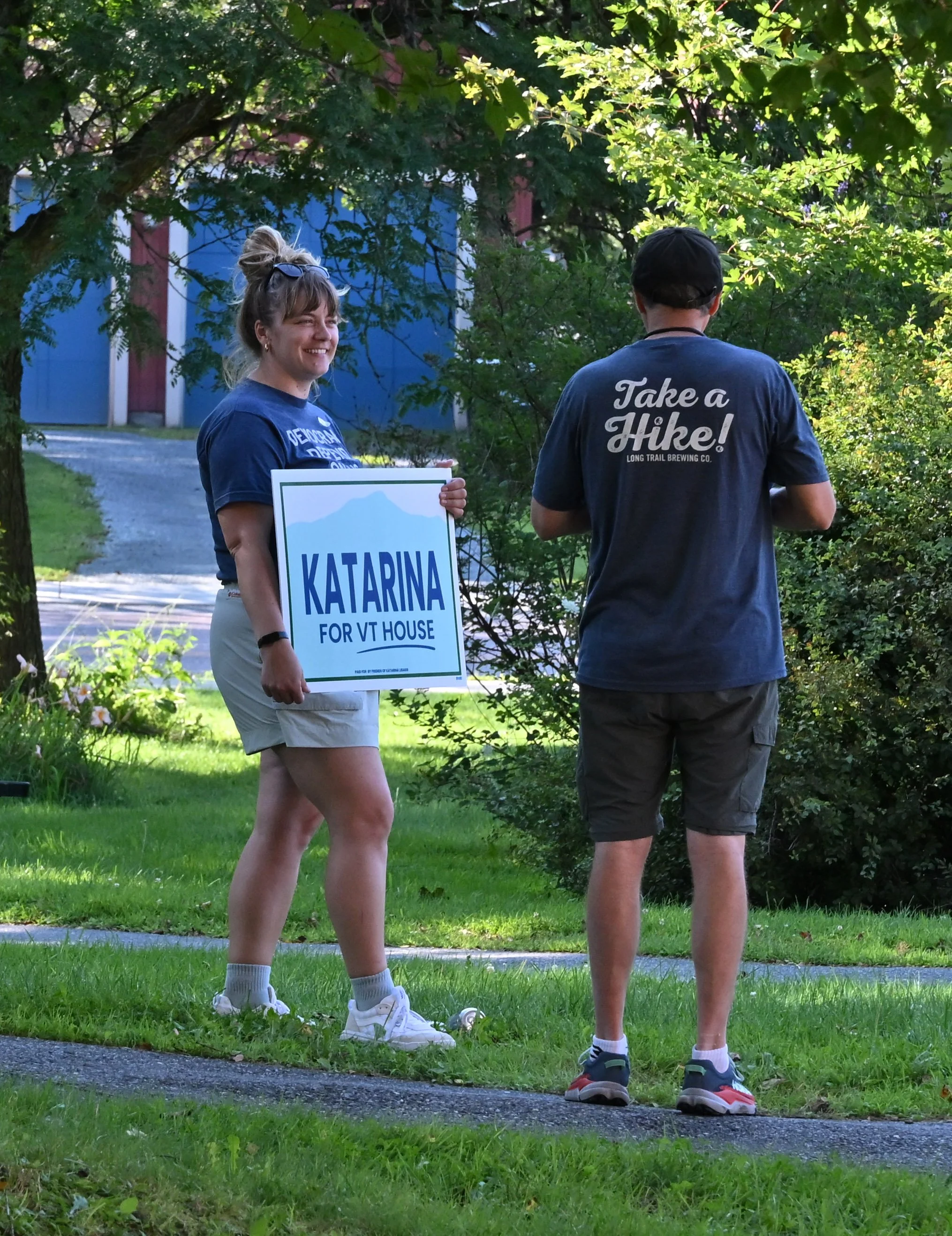   First-time legislative candidate Katarina Lisaius meets voters outside Brookside Primary School. The former Waterbury recreation director lives in Bolton. Photo by Gordon Miller  